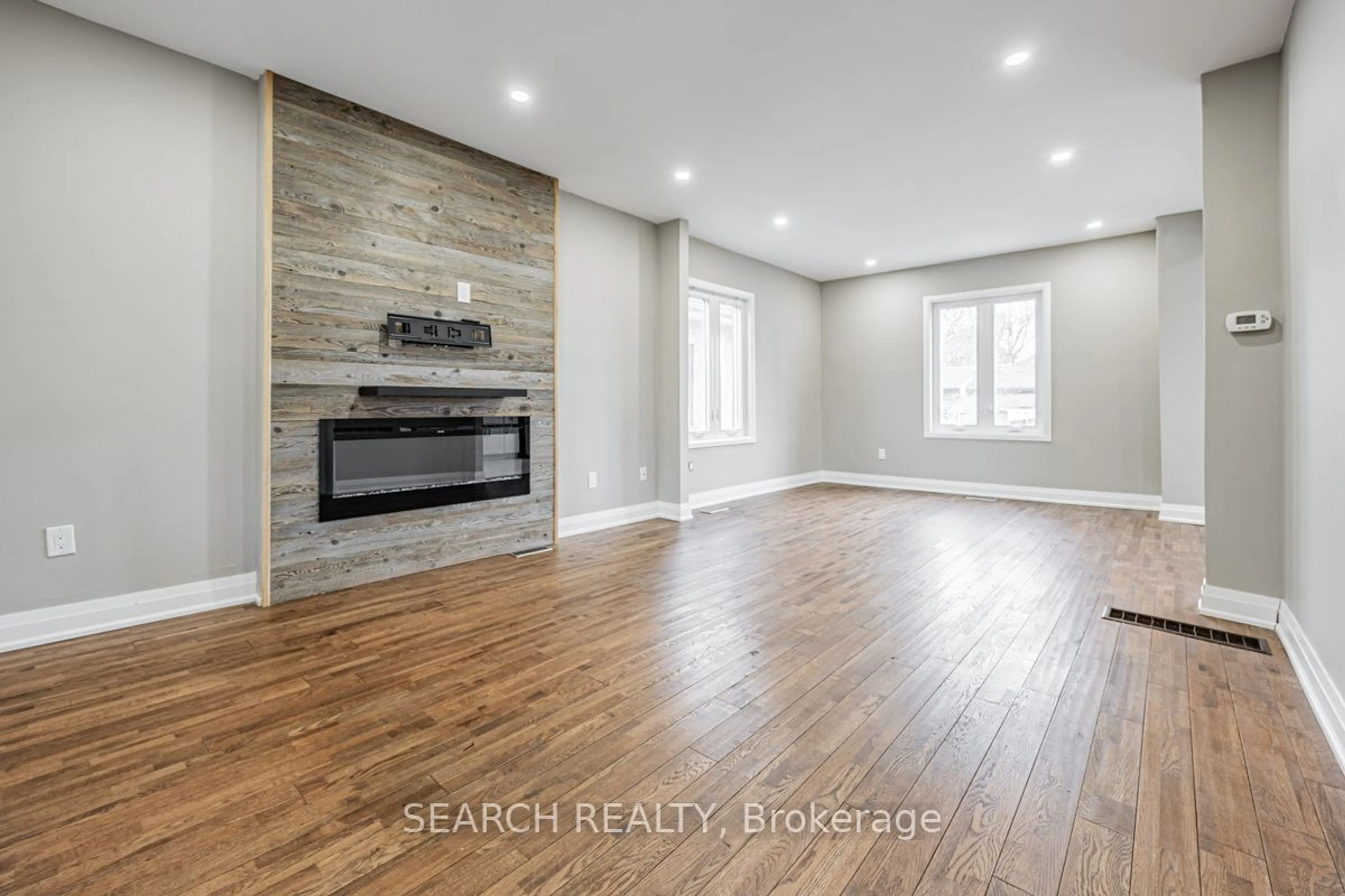 Living room, wood floors for 201 Ritson Rd, Oshawa Ontario L1H 5H6