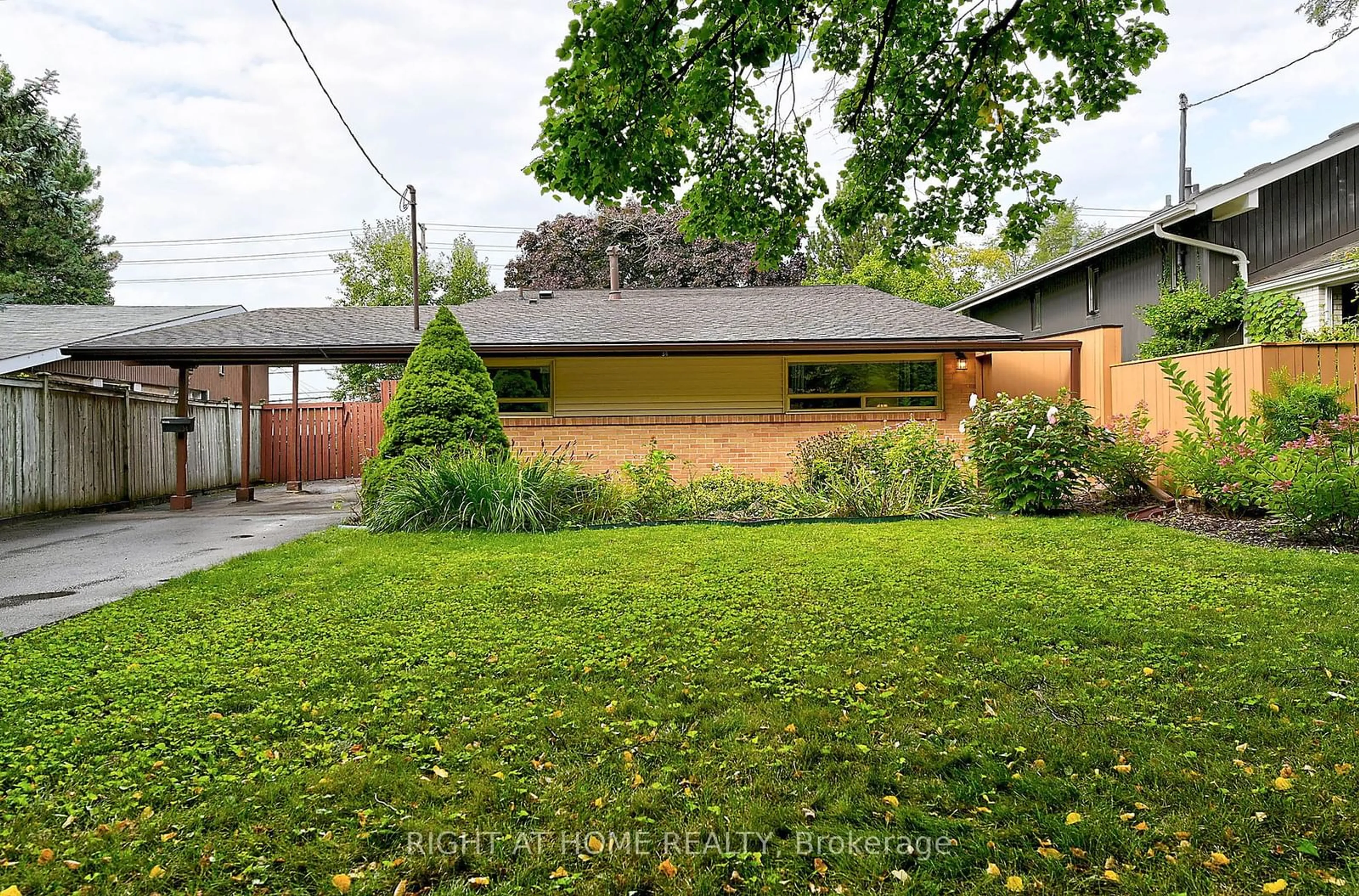 Frontside or backside of a home, the fenced backyard for 34 Oakley Blvd, Toronto Ontario M1P 3P3