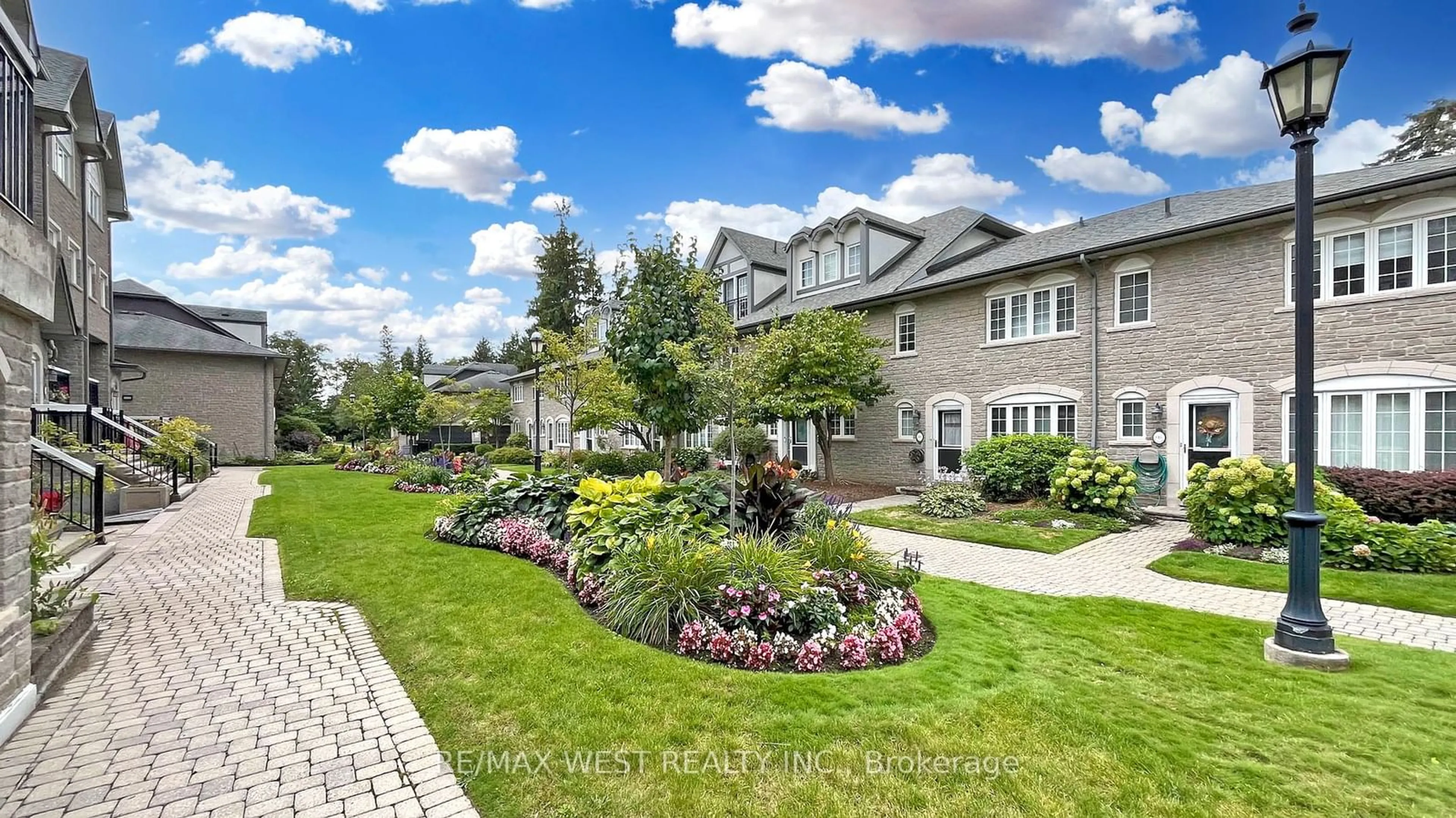 A pic from exterior of the house or condo, the fenced backyard for 1995 Royal Rd #201, Pickering Ontario L1V 6V9