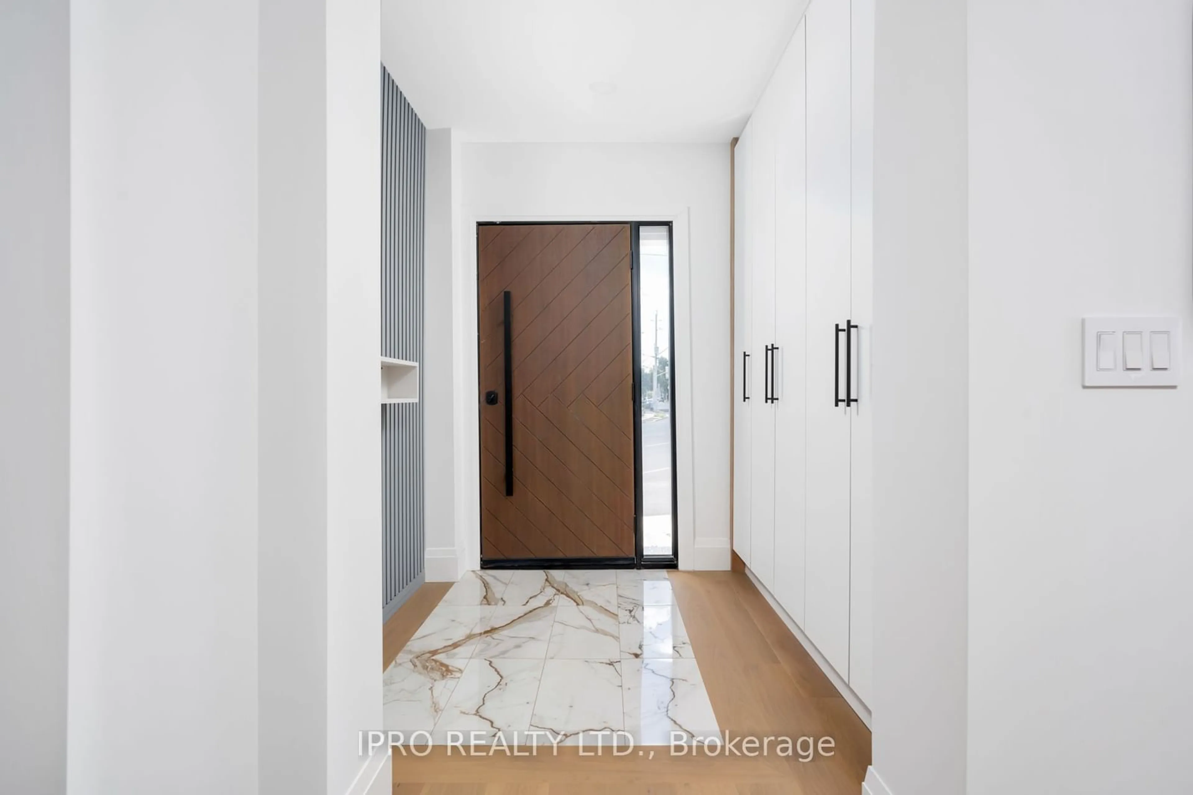 Indoor foyer, wood floors for 1384 Pape Ave, Toronto Ontario M4K 3X5