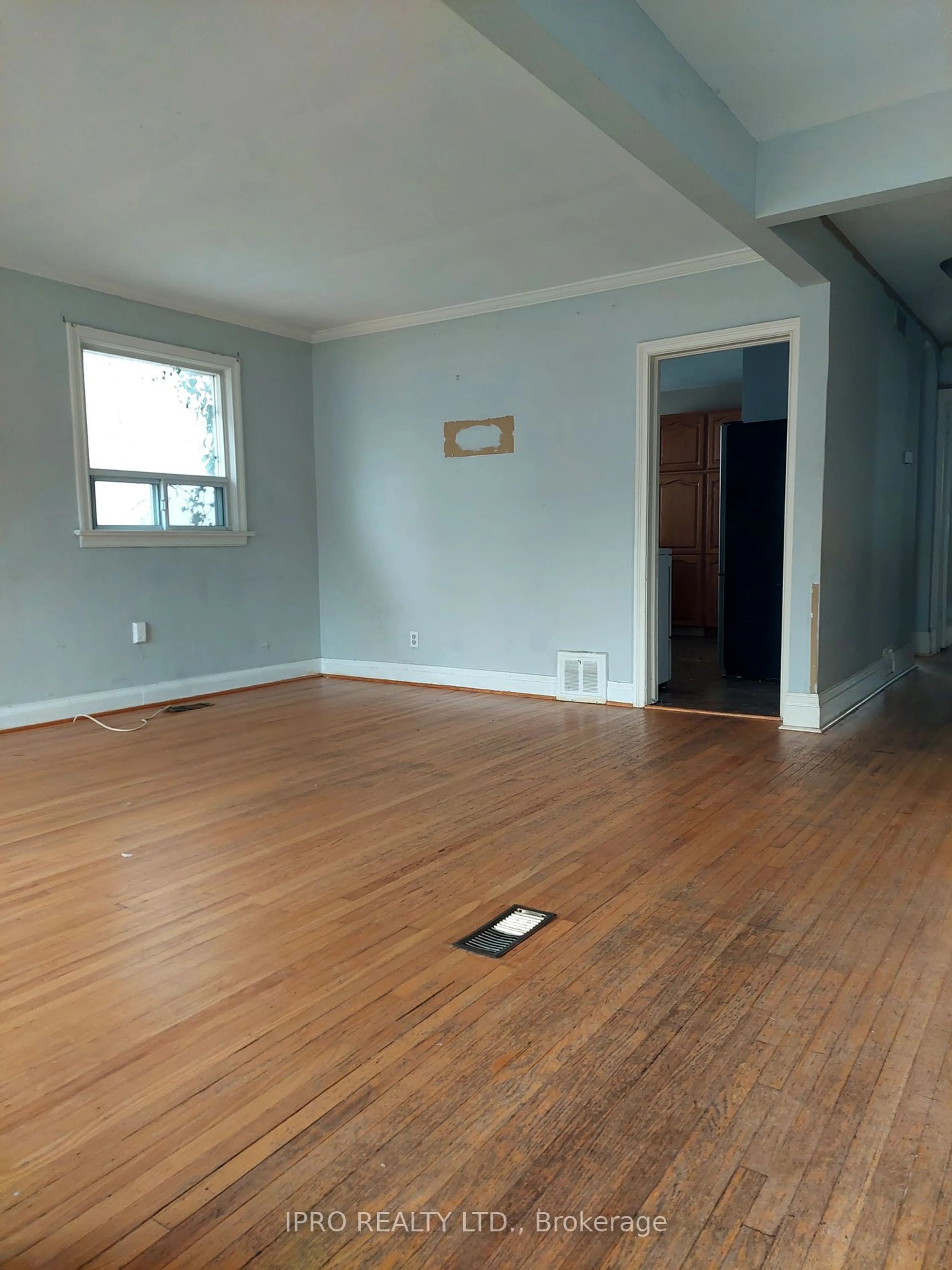 A pic of a room, wood floors for 12 Harewood Ave, Toronto Ontario M1M 2R2