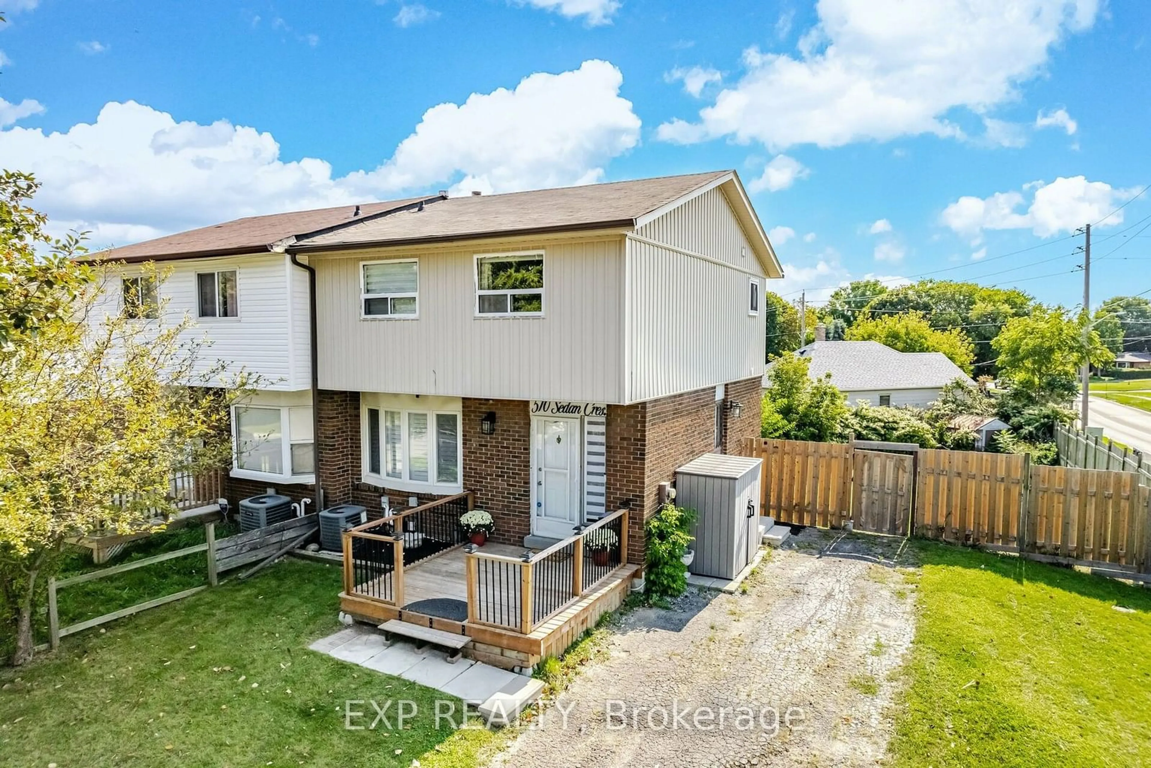 Frontside or backside of a home, the fenced backyard for 510 Sedan Cres, Oshawa Ontario L1H 3G5