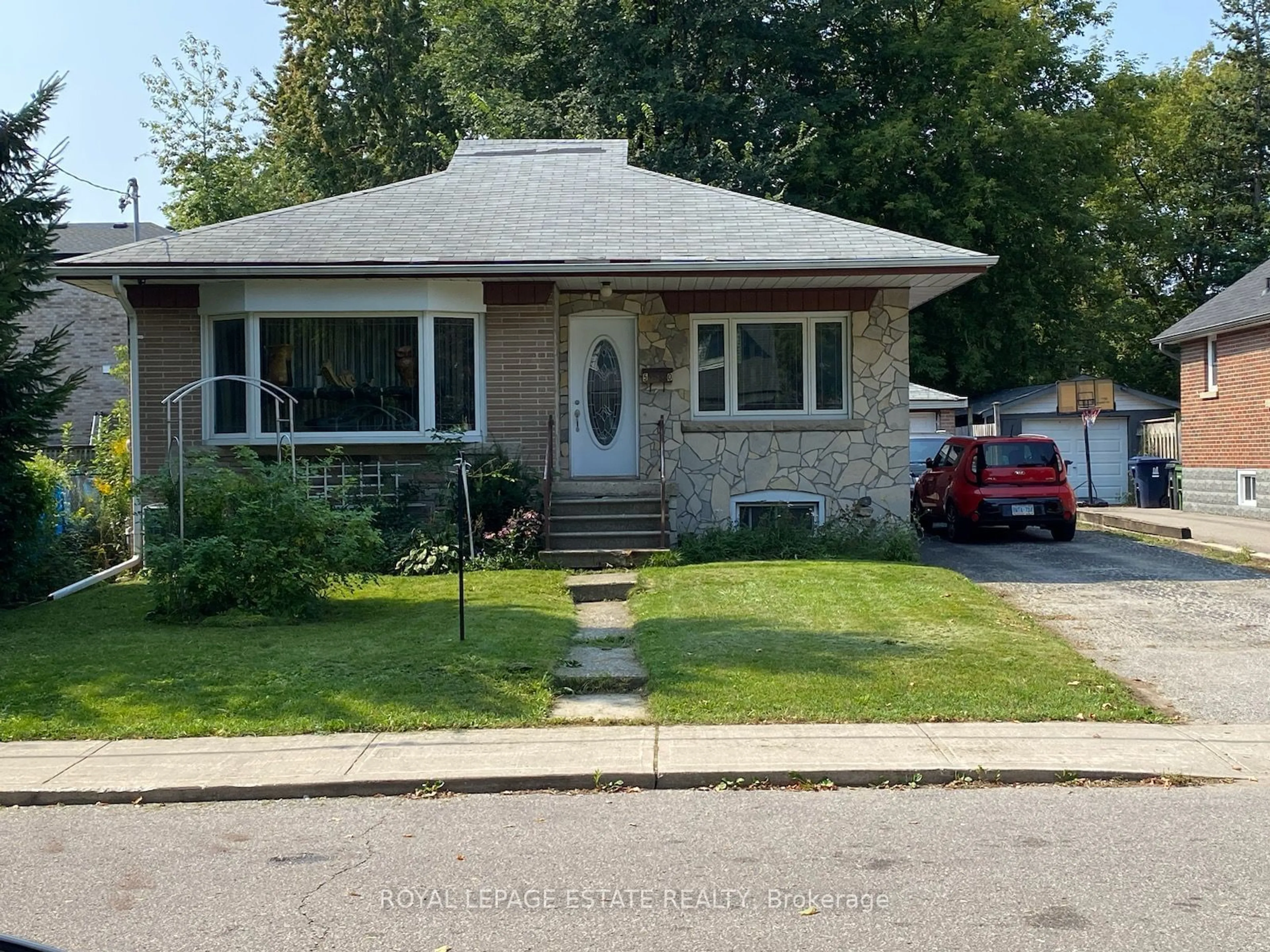 Frontside or backside of a home for 50 Sandown Ave, Toronto Ontario M1N 3W3