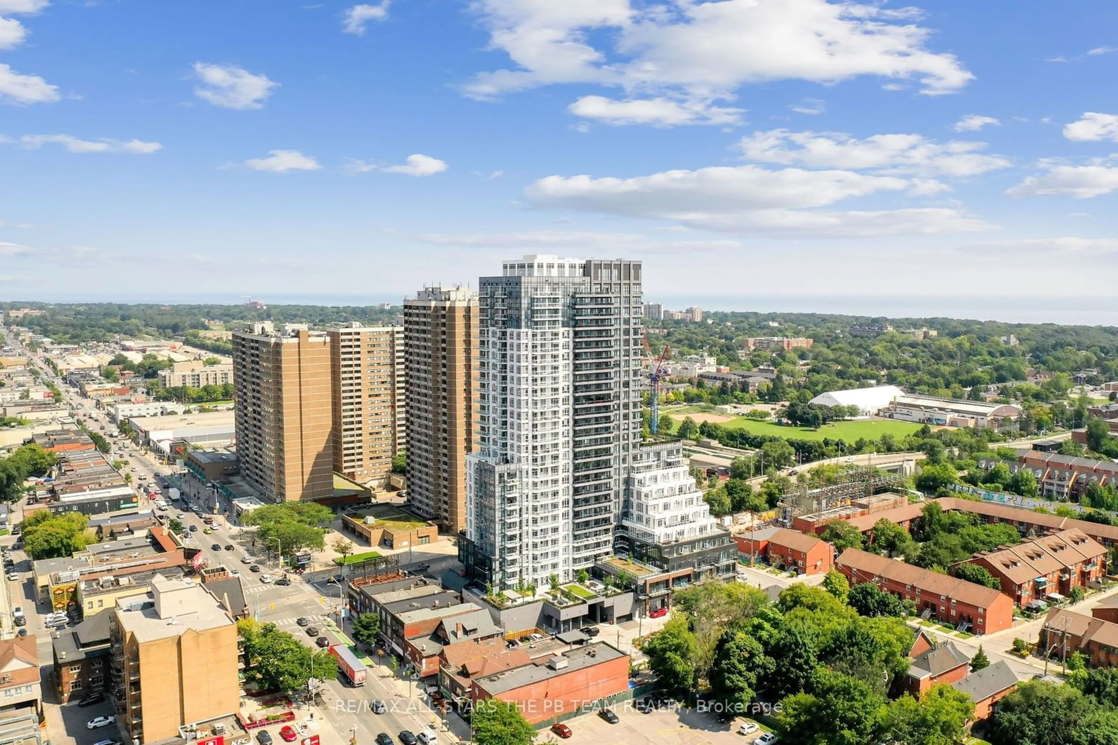 A pic from exterior of the house or condo, the view of city buildings for 286 Main St #1403, Toronto Ontario M4C 0B3