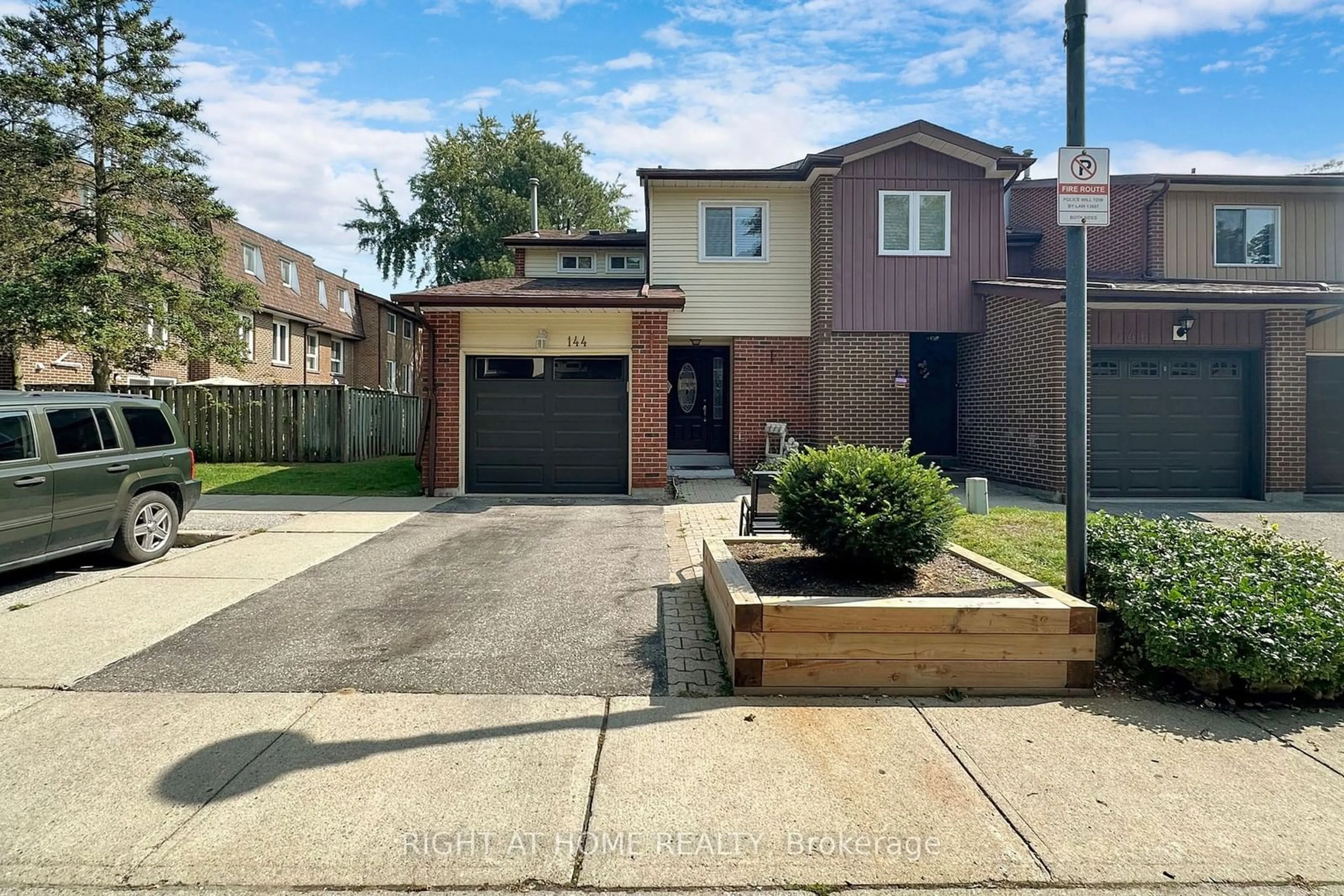 Frontside or backside of a home, the fenced backyard for 4662 Kingston Rd #144, Toronto Ontario M1E 4Y7