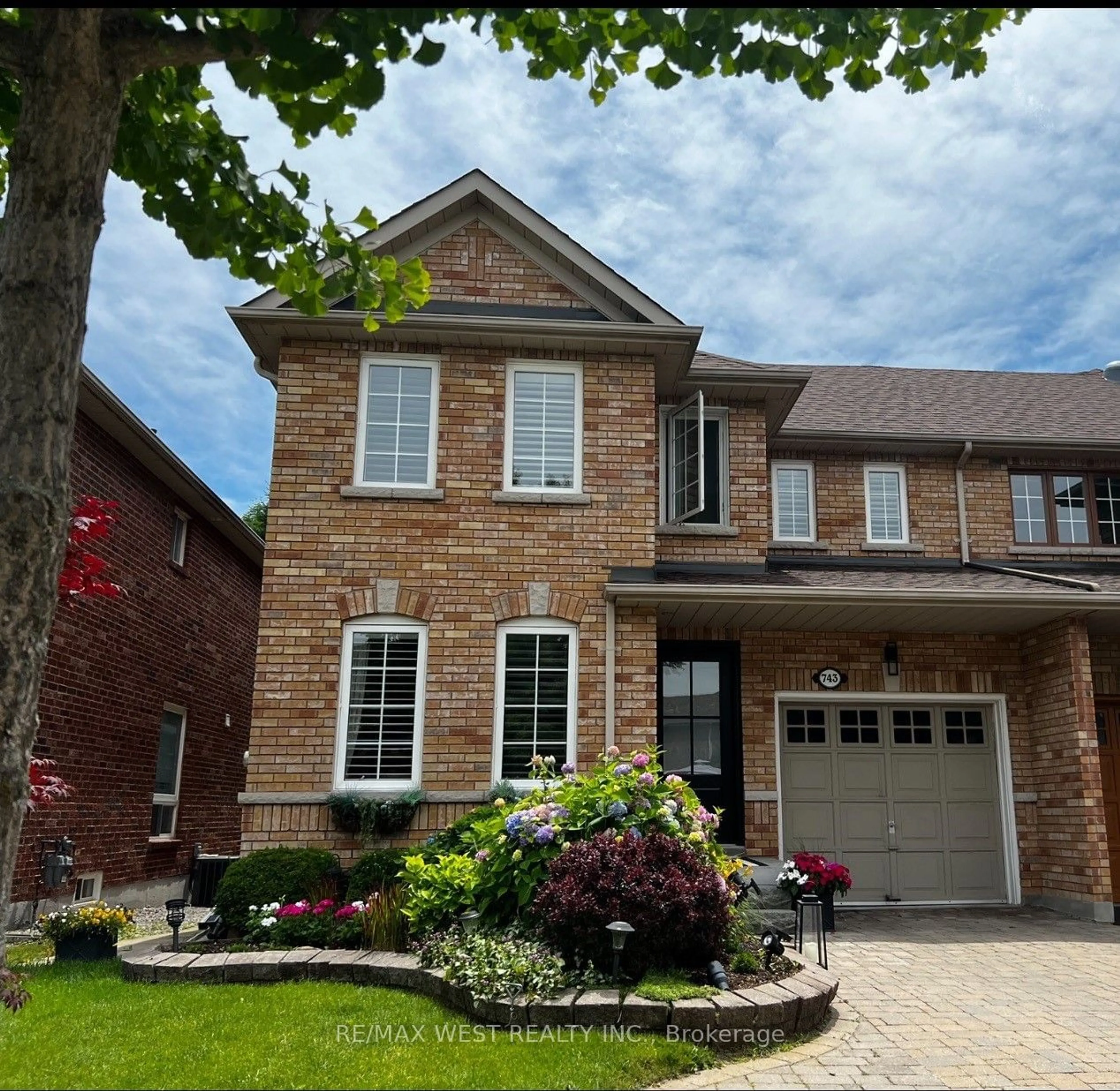 Home with brick exterior material for 743 Craighurst Crt, Pickering Ontario L1X 2X1