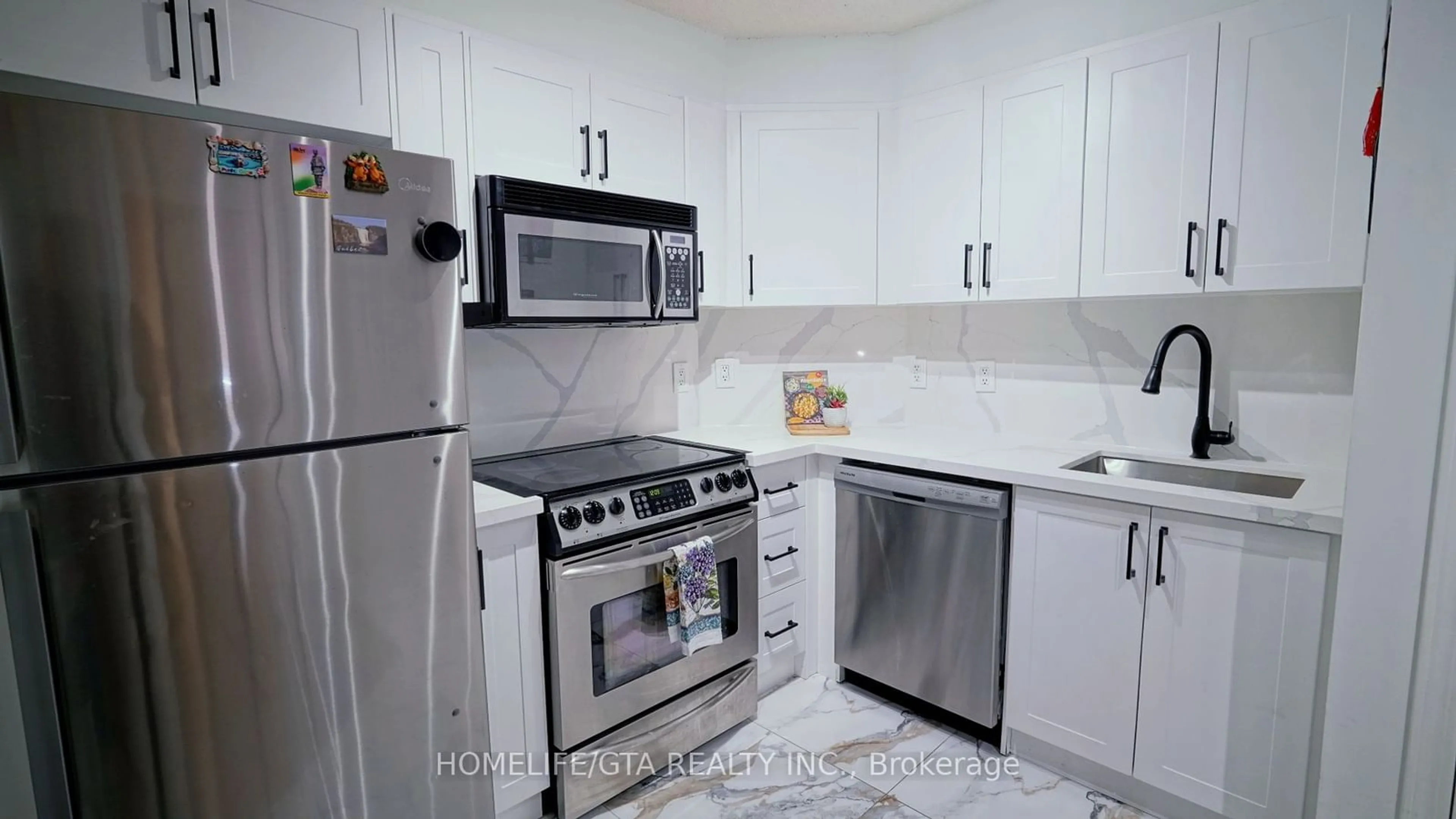 Standard kitchen, ceramic floors, mountain for 5235 Finch Ave #324, Toronto Ontario M1S 5X3