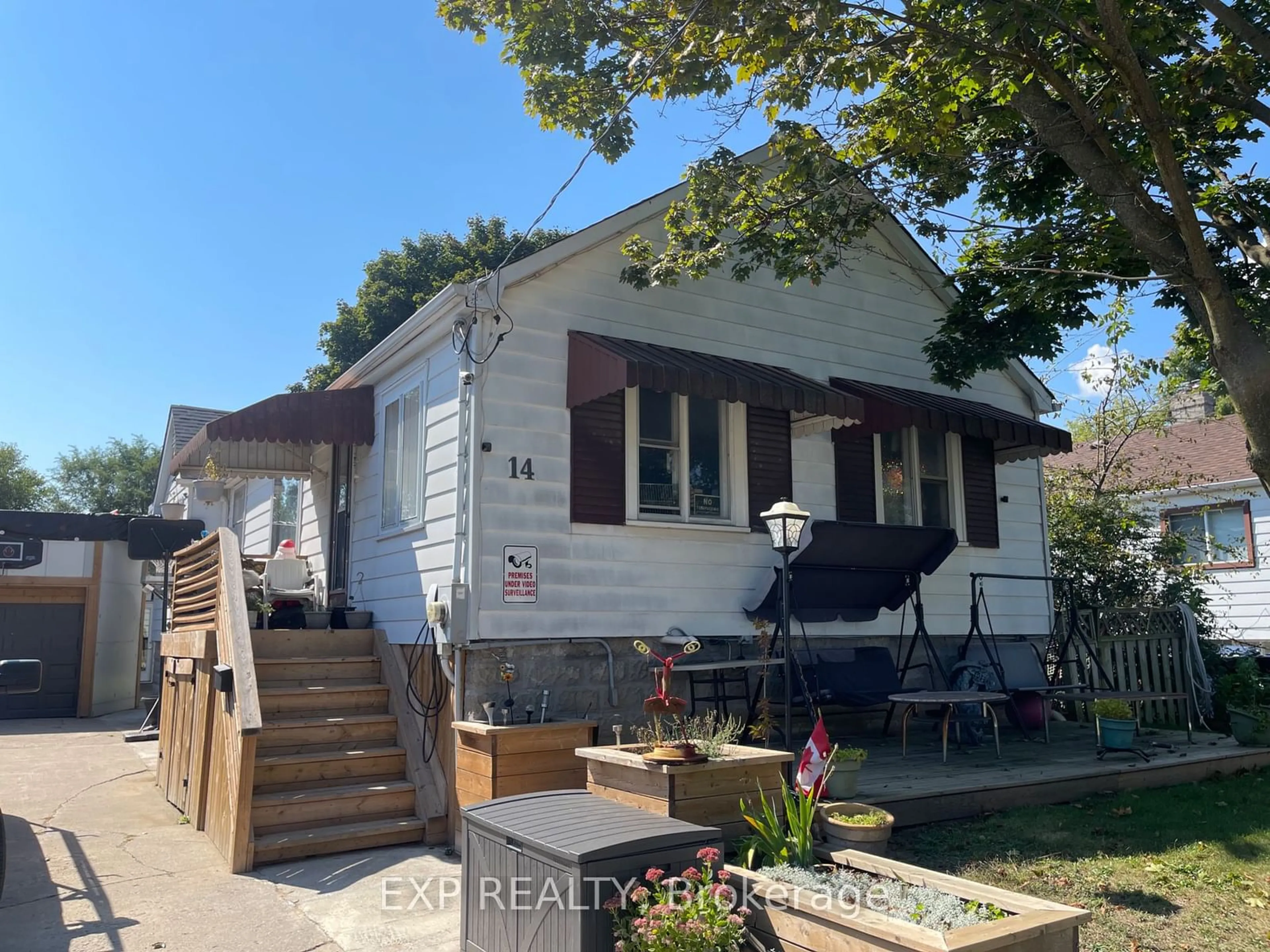 Frontside or backside of a home for 14 Fairwood Cres, Toronto Ontario M1E 3T1