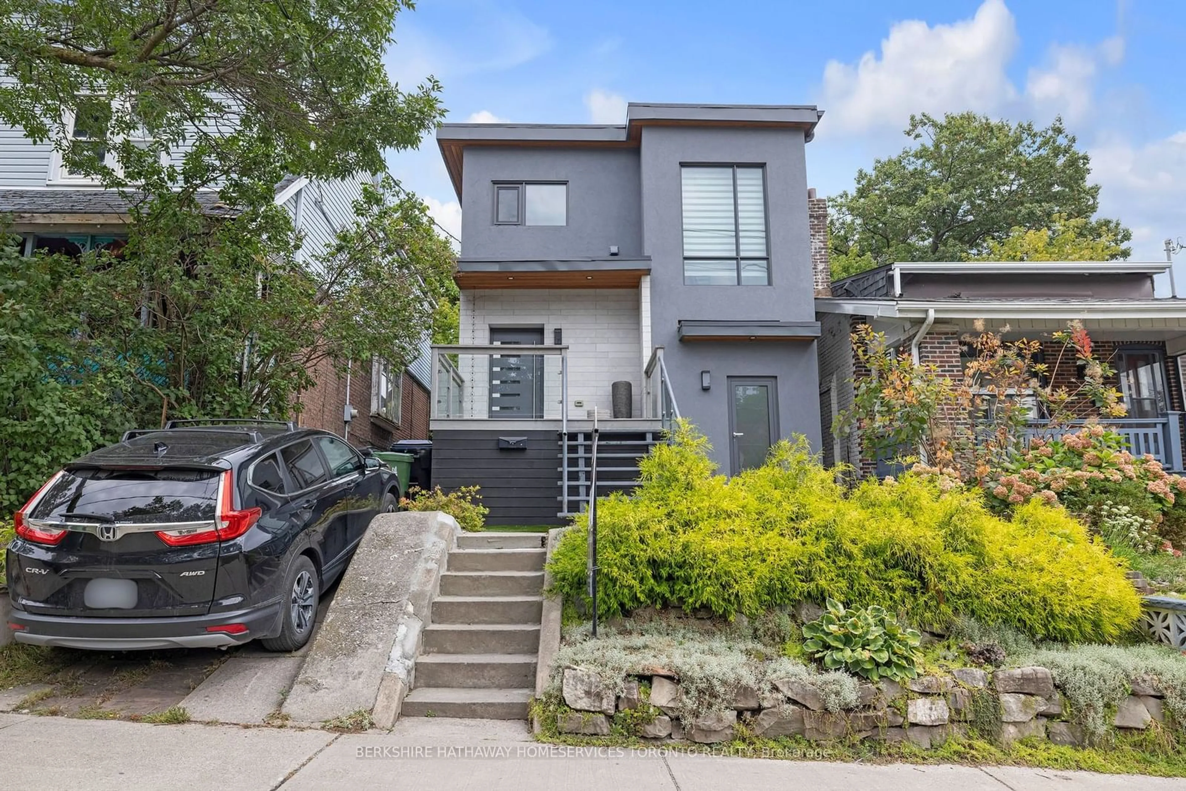 Frontside or backside of a home, the street view for 37 Woodmount Ave, Toronto Ontario M4C 3X6