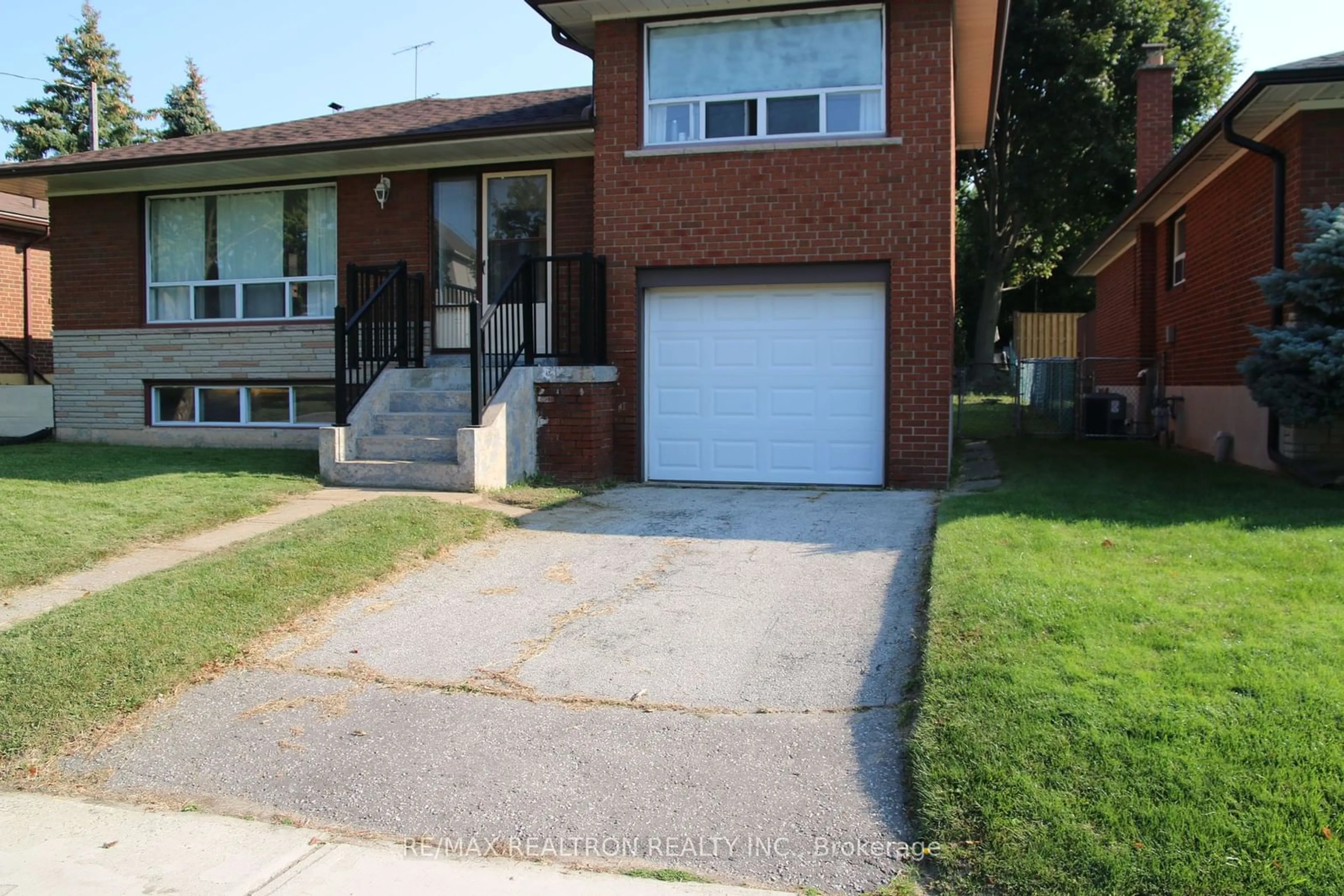 Frontside or backside of a home for 65 Packard Blvd, Toronto Ontario M1P 4K6