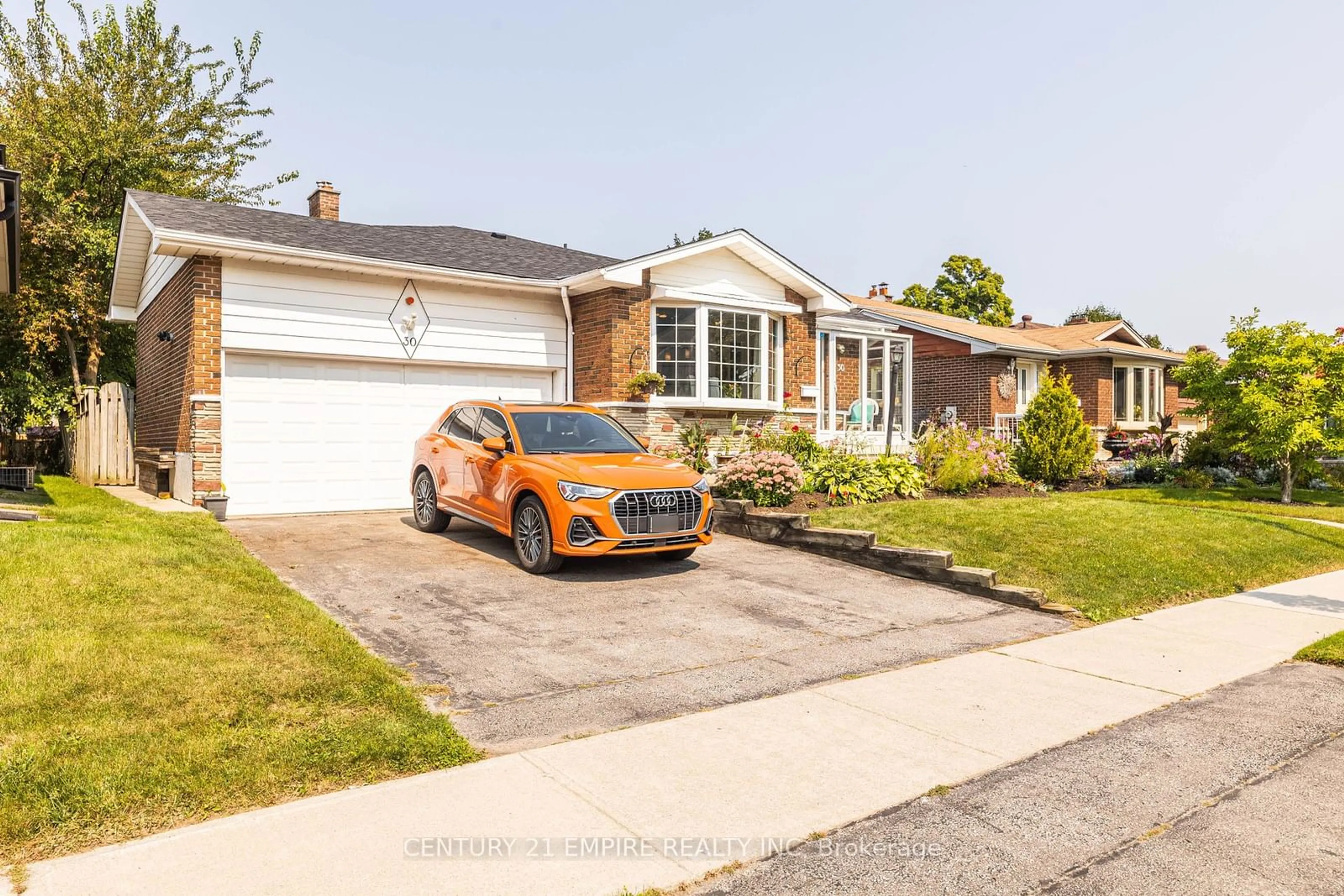 Frontside or backside of a home, the street view for 30 Stainforth Dr, Toronto Ontario M1S 1L8