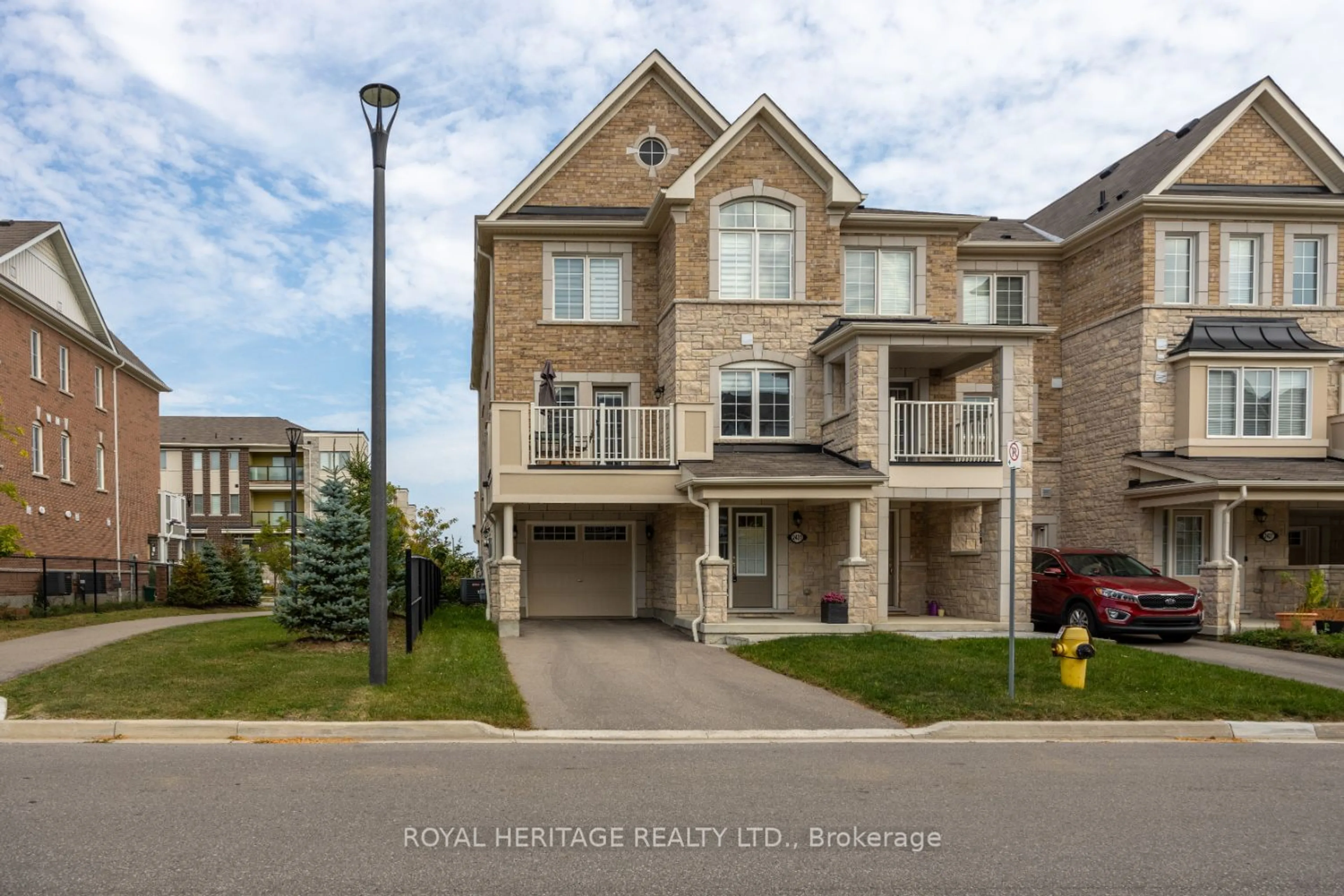 A pic from exterior of the house or condo, the street view for 2431 Fall Harvest Cres, Pickering Ontario L1X 0G1