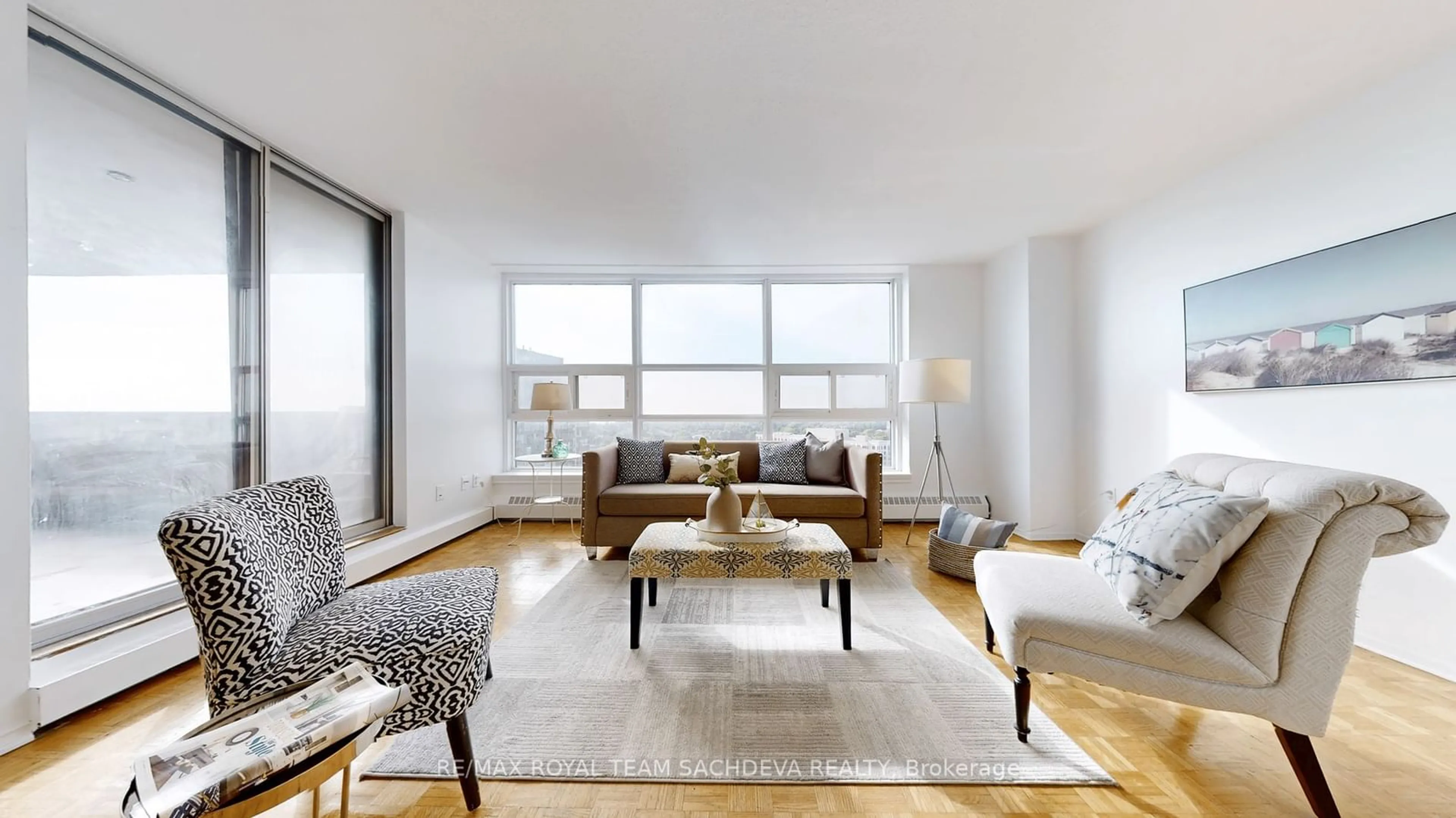 Living room, wood floors for 3380 Eglinton Ave #1709, Toronto Ontario M1J 3L6