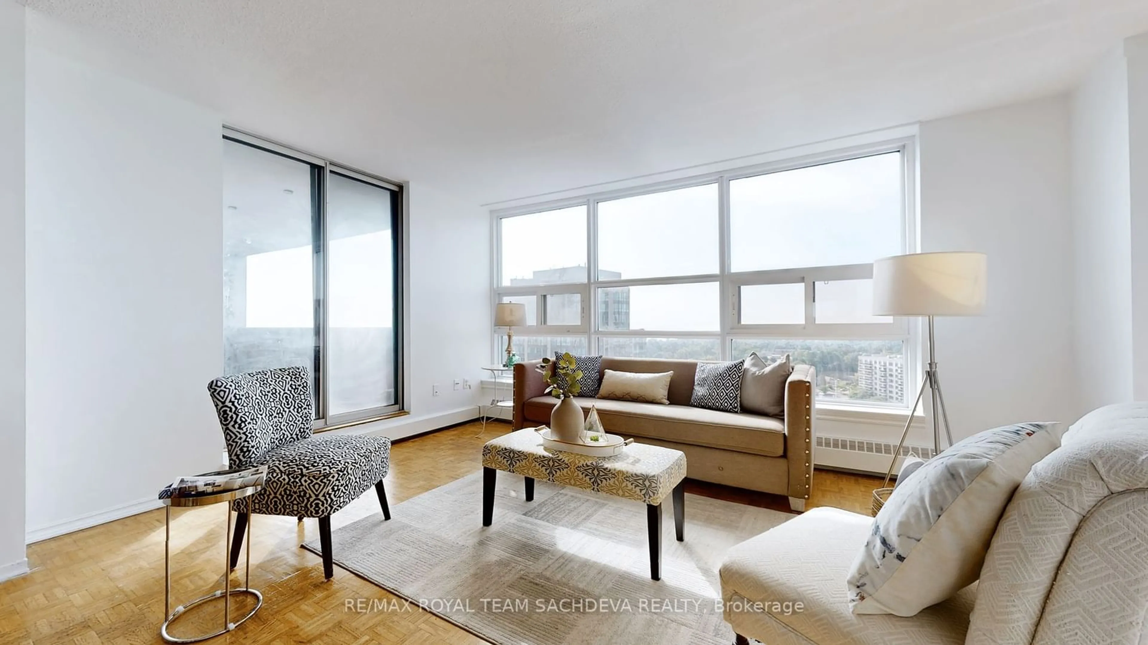 Living room, wood floors for 3380 Eglinton Ave #1709, Toronto Ontario M1J 3L6