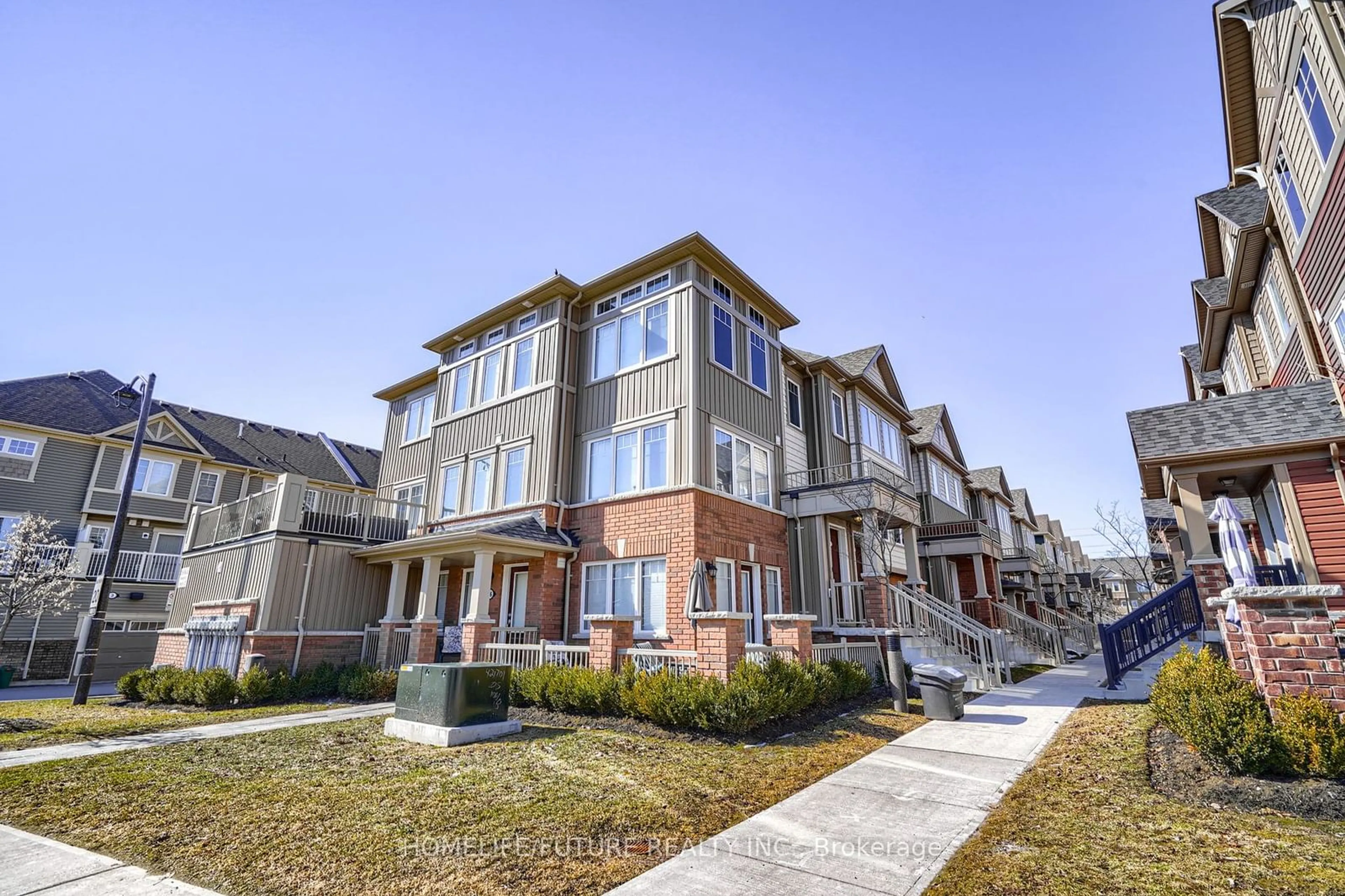 A pic from exterior of the house or condo, the street view for 2500 Hill Rise Crt #46, Oshawa Ontario L1L 0M6