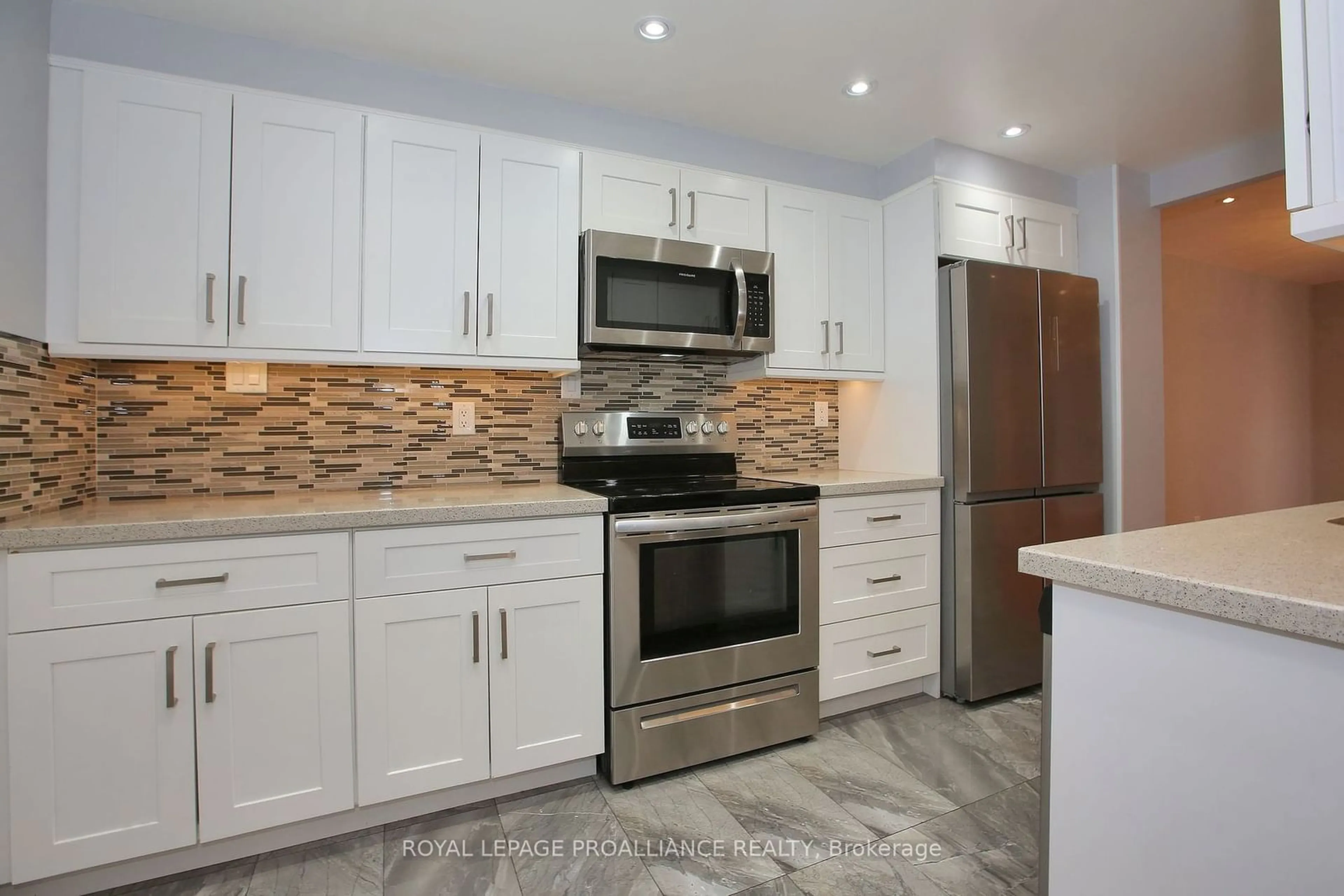 Open concept kitchen for 3151 Bridletowne Circ #1604, Toronto Ontario M1W 2T1