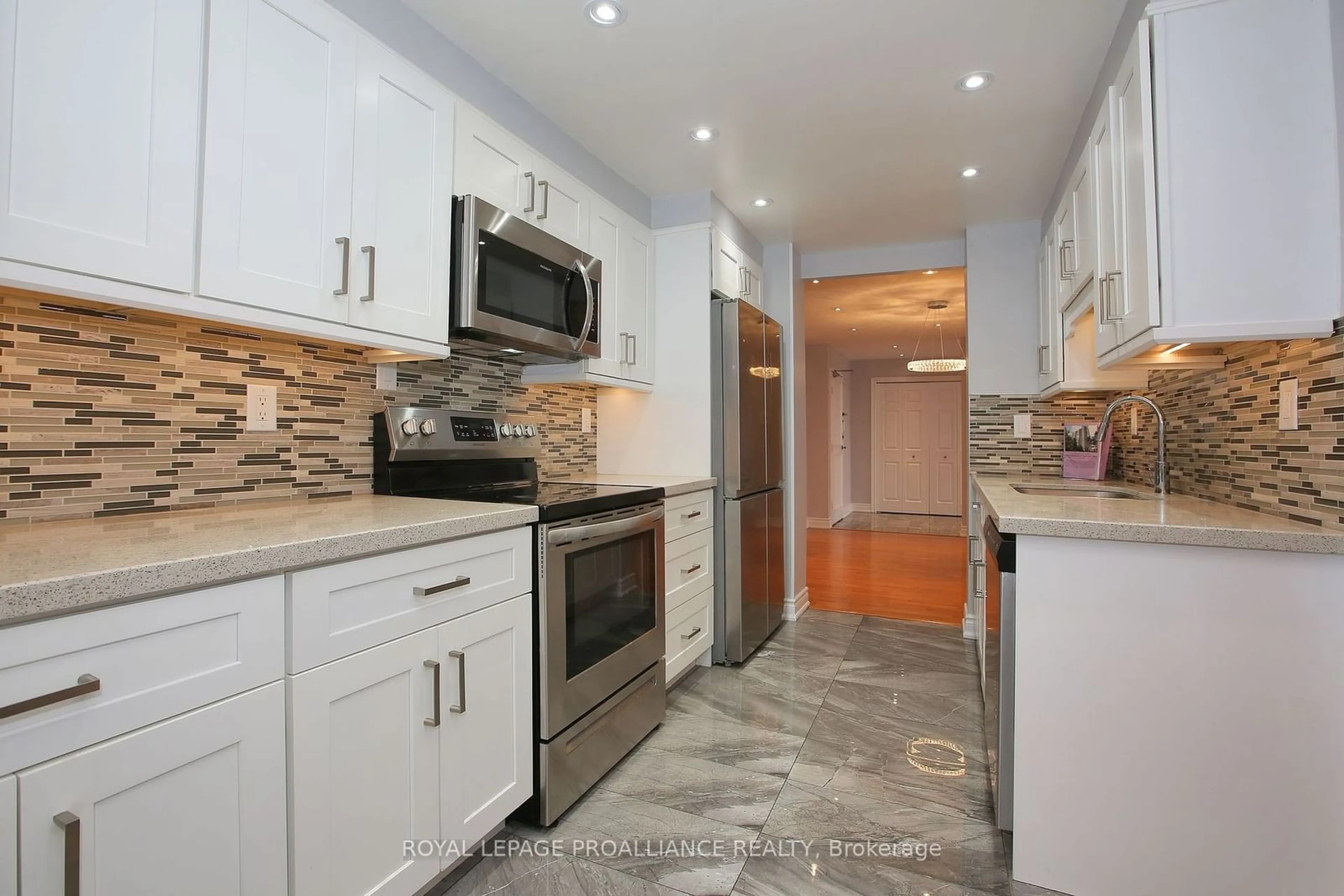 Open concept kitchen for 3151 Bridletowne Circ #1604, Toronto Ontario M1W 2T1