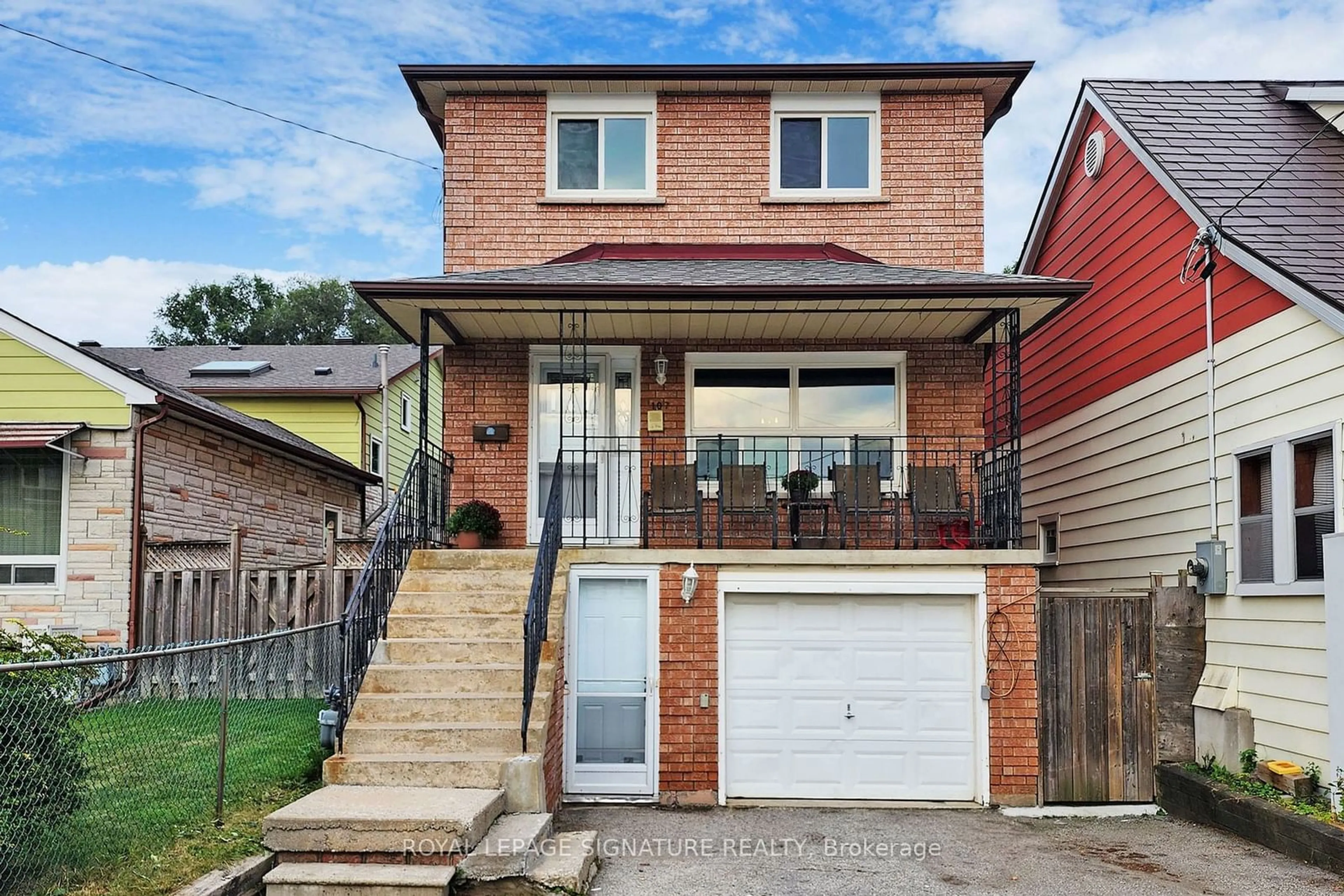 Frontside or backside of a home for 107 South Bonnington Ave, Toronto Ontario M1N 3M4