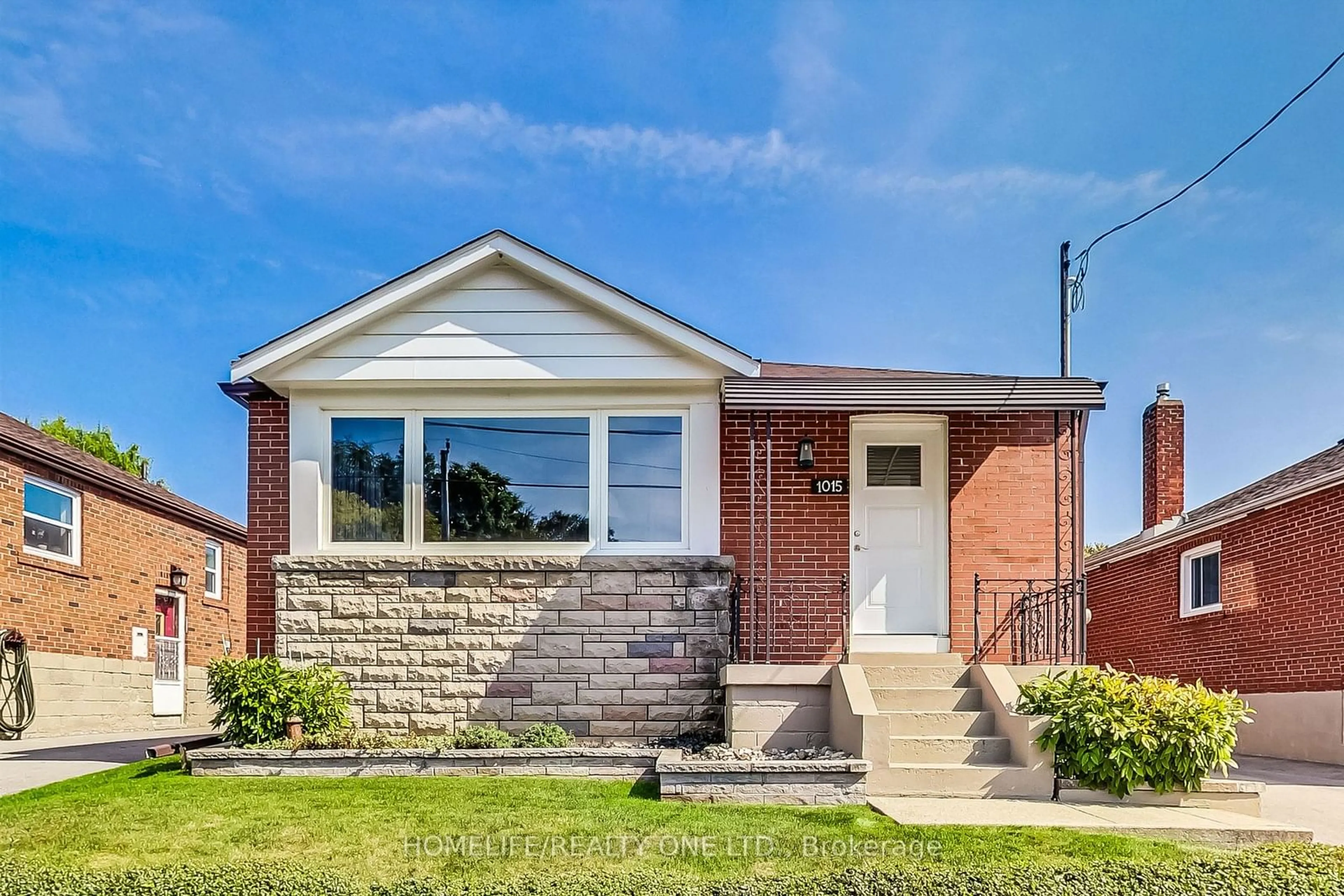 Home with brick exterior material for 1015 Victoria Park Ave, Toronto Ontario M4B 2J7