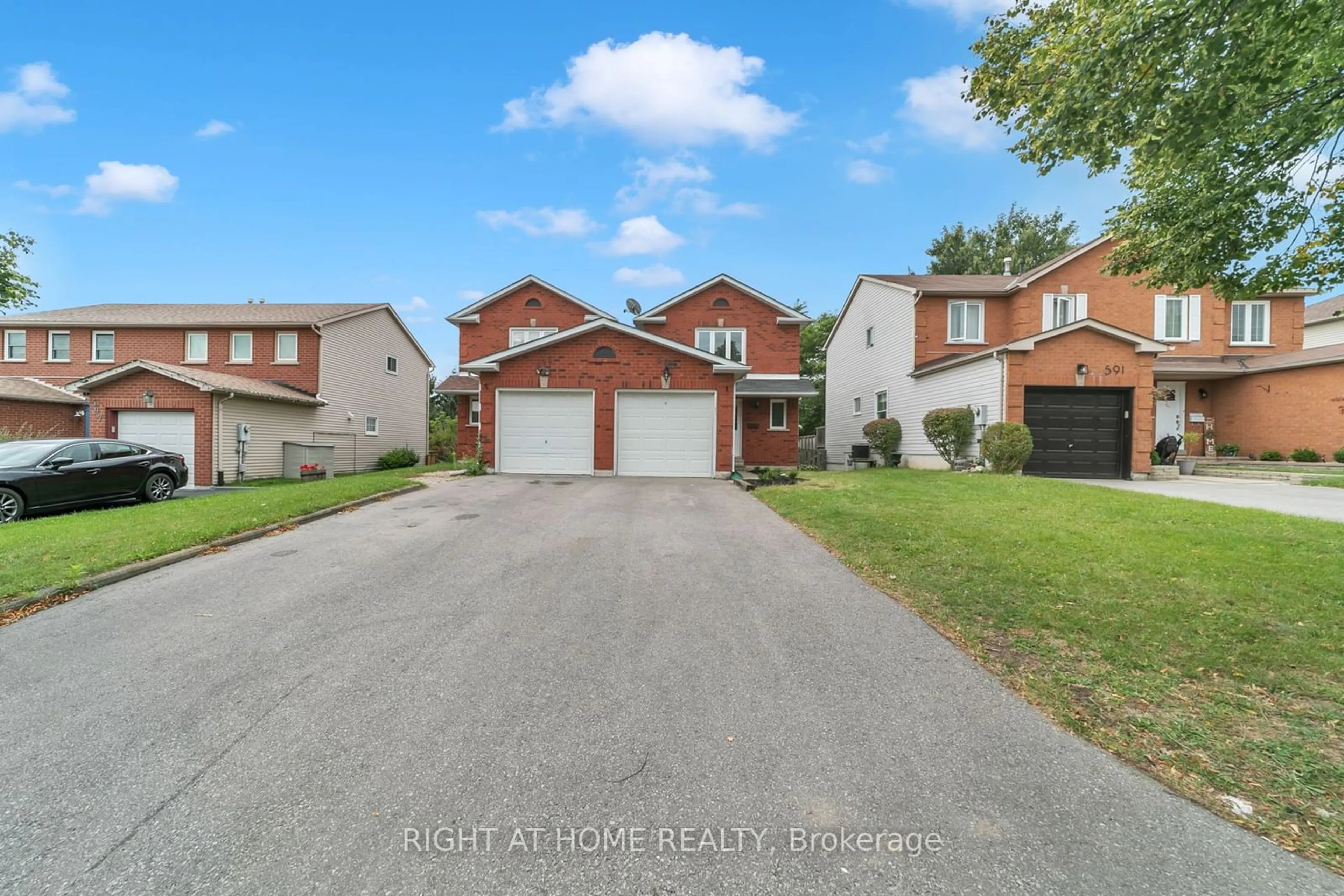 Frontside or backside of a home, the street view for 593 Cobblehill Dr, Oshawa Ontario L1K 1Y6