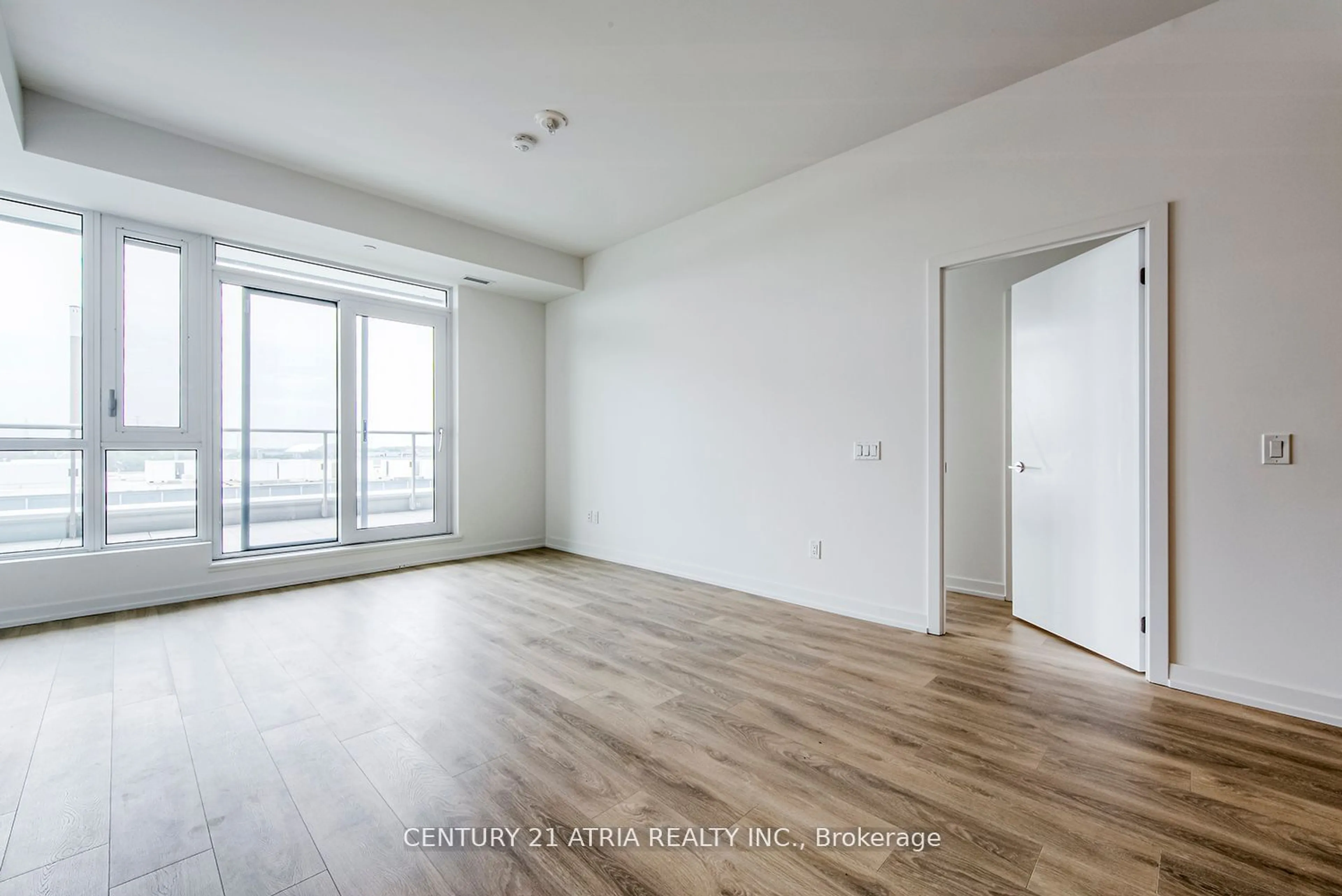 A pic of a room, wood floors for 150 Logan Ave #705, Toronto Ontario M4M 1C3