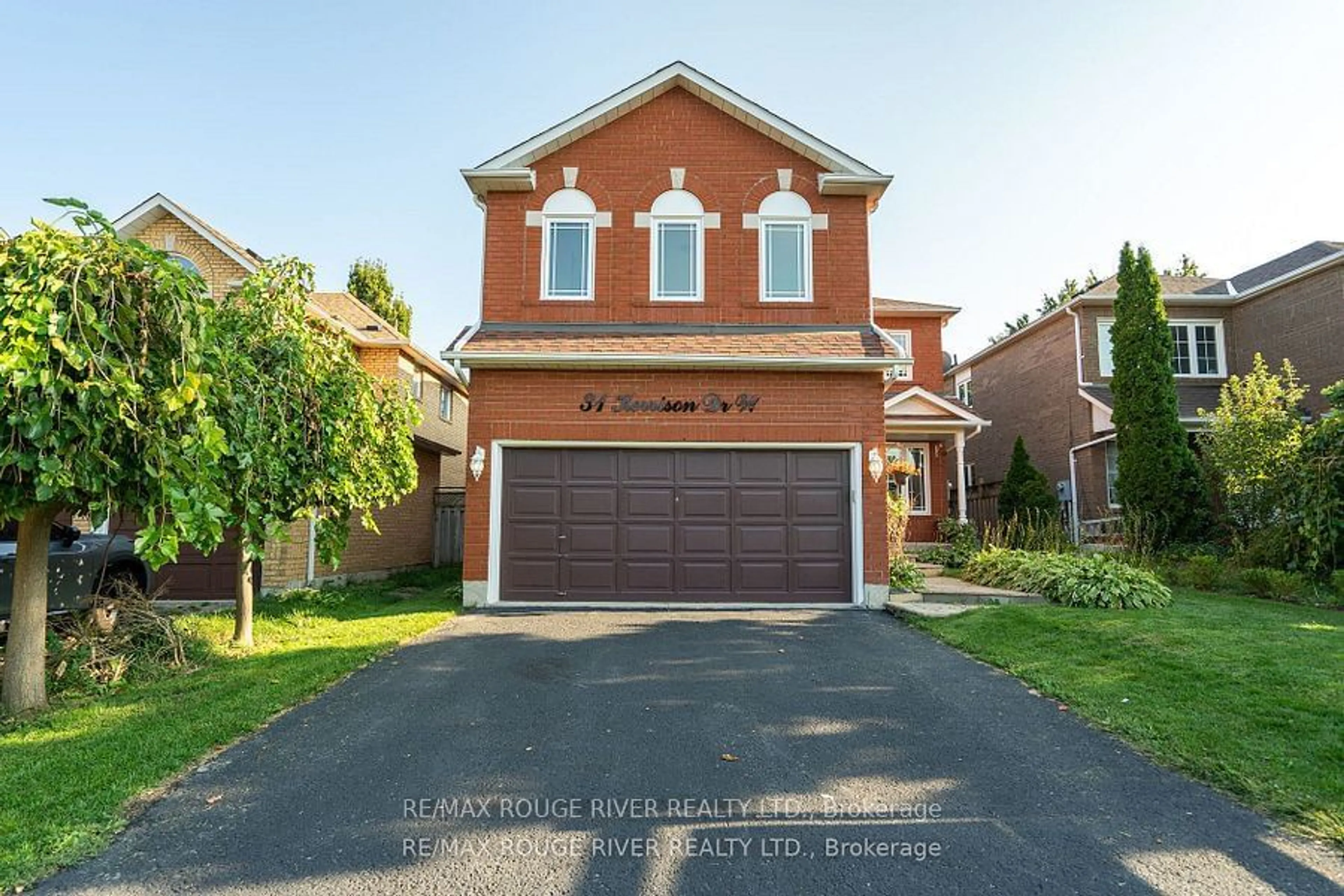 Frontside or backside of a home, the street view for 31 Kerrison Dr, Ajax Ontario L1Z 1K2