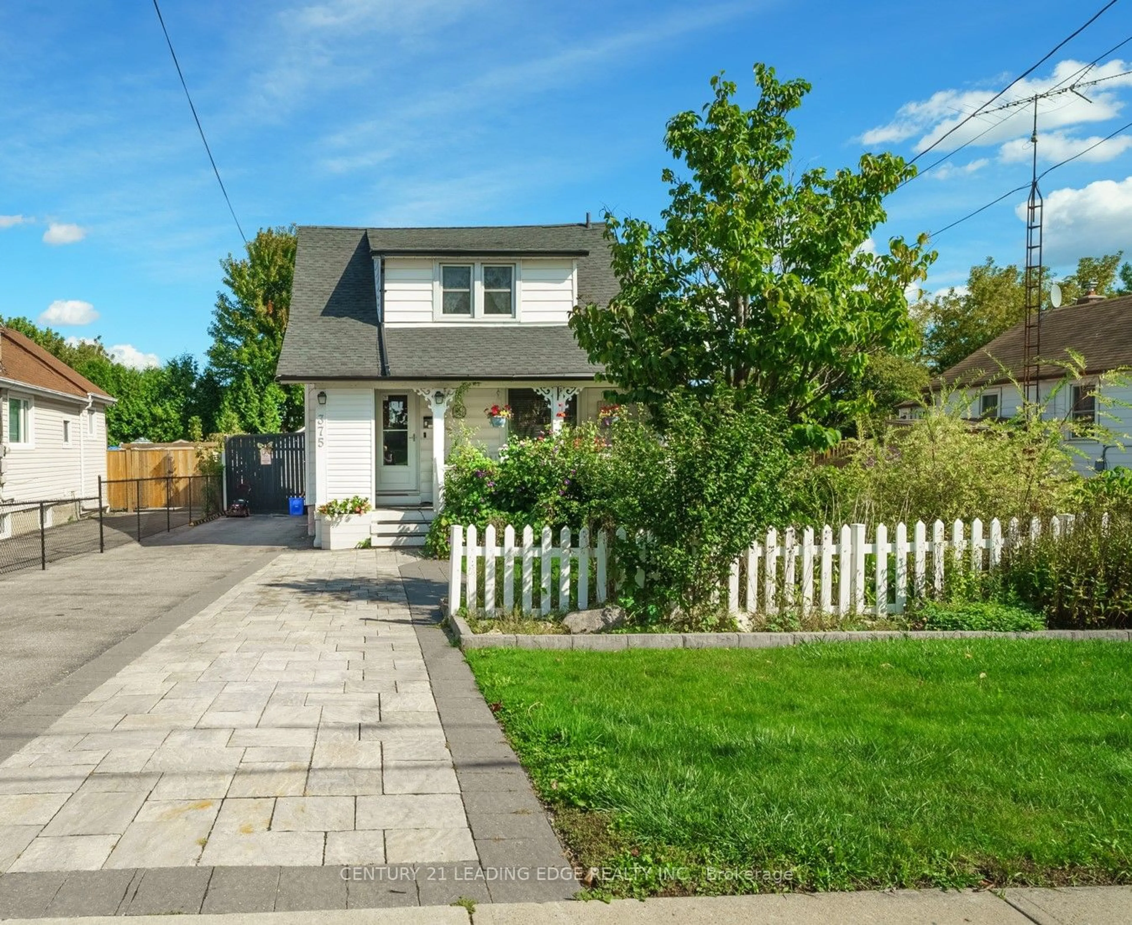 Frontside or backside of a home, the fenced backyard for 375 Gibbons St, Oshawa Ontario L1J 4Z1