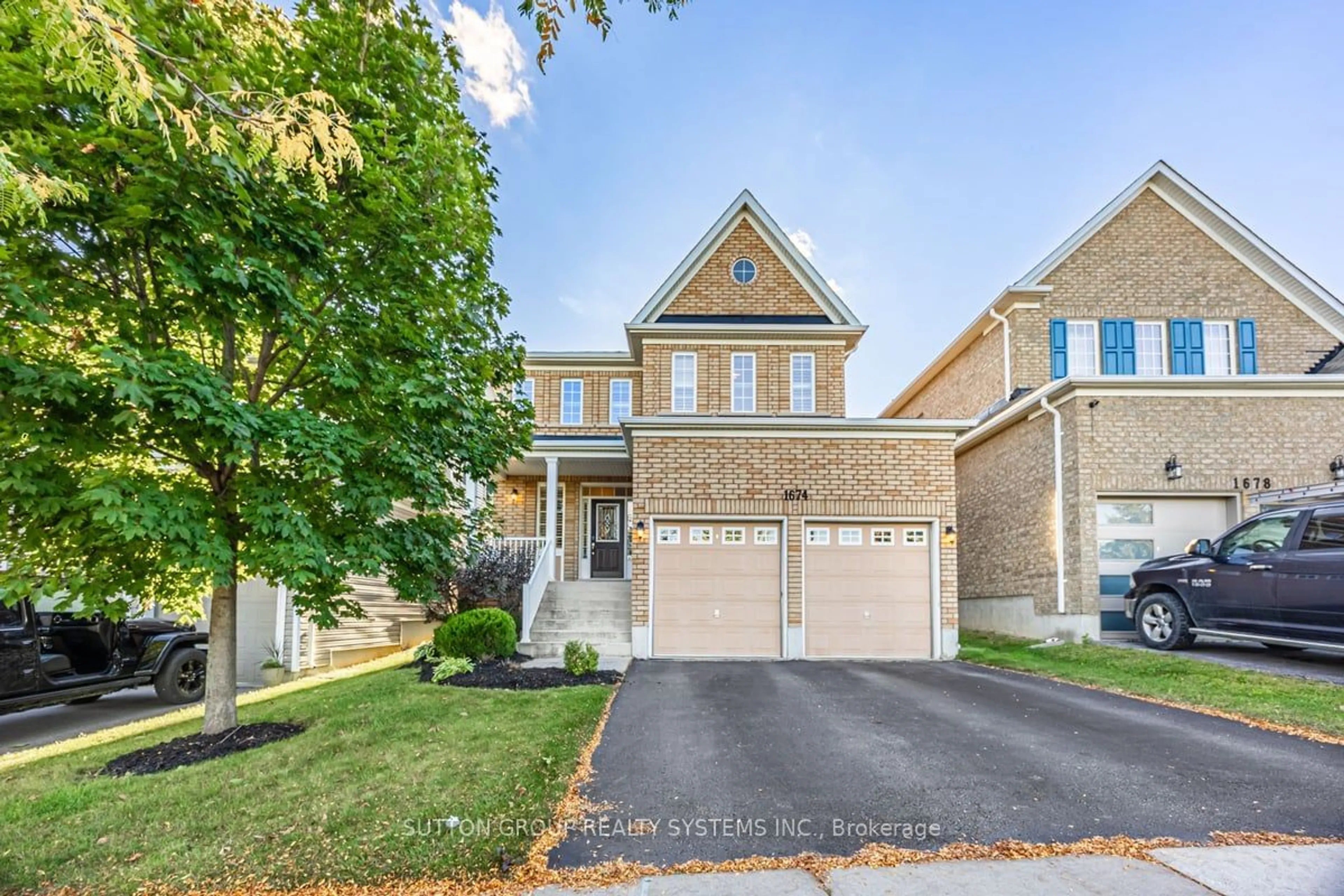 A pic from exterior of the house or condo, the street view for 1674 Badgley Dr, Oshawa Ontario L1K 0H3