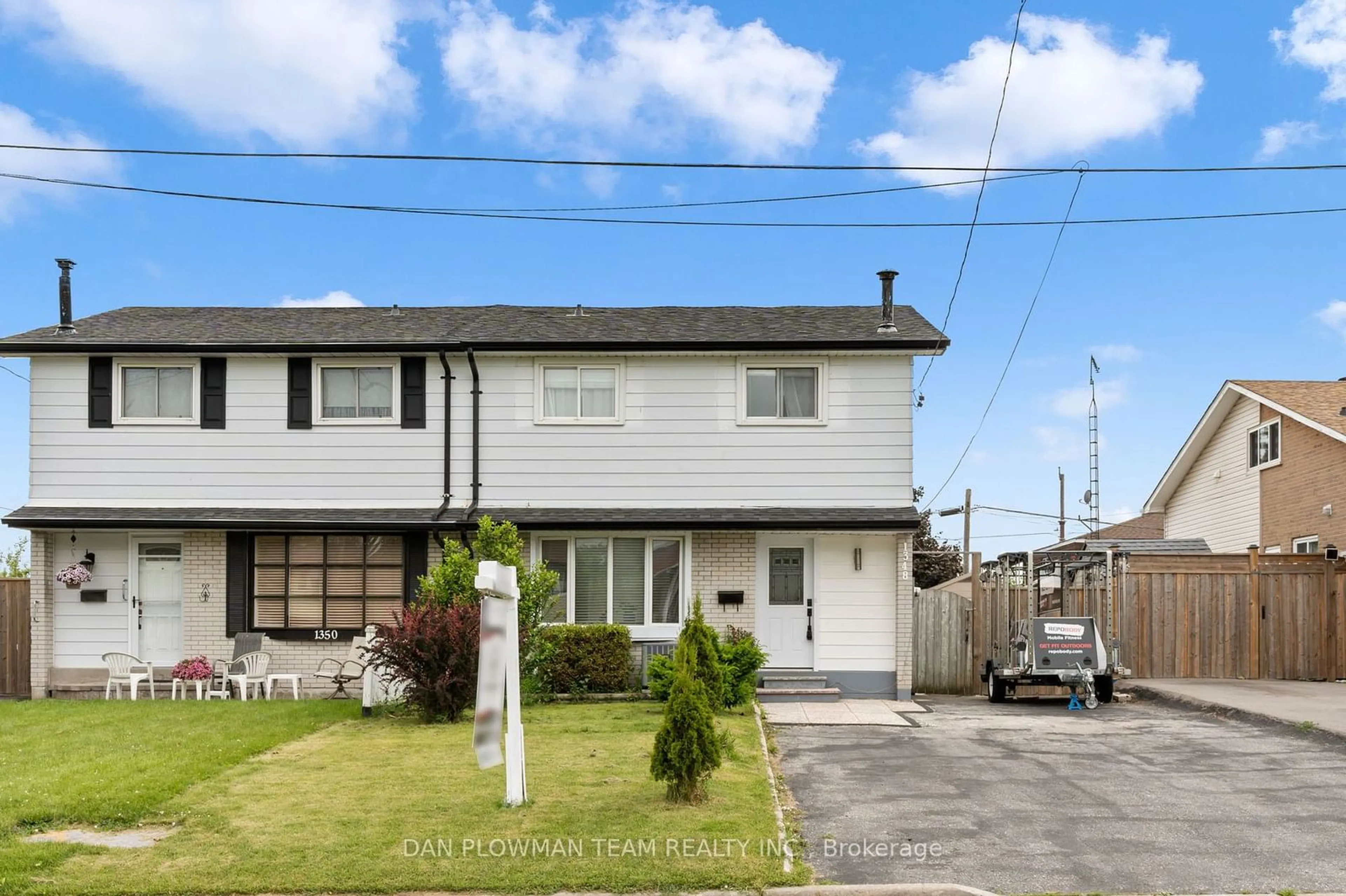 Frontside or backside of a home, the fenced backyard for 1348 Lakefield St, Oshawa Ontario L1J 3Y8