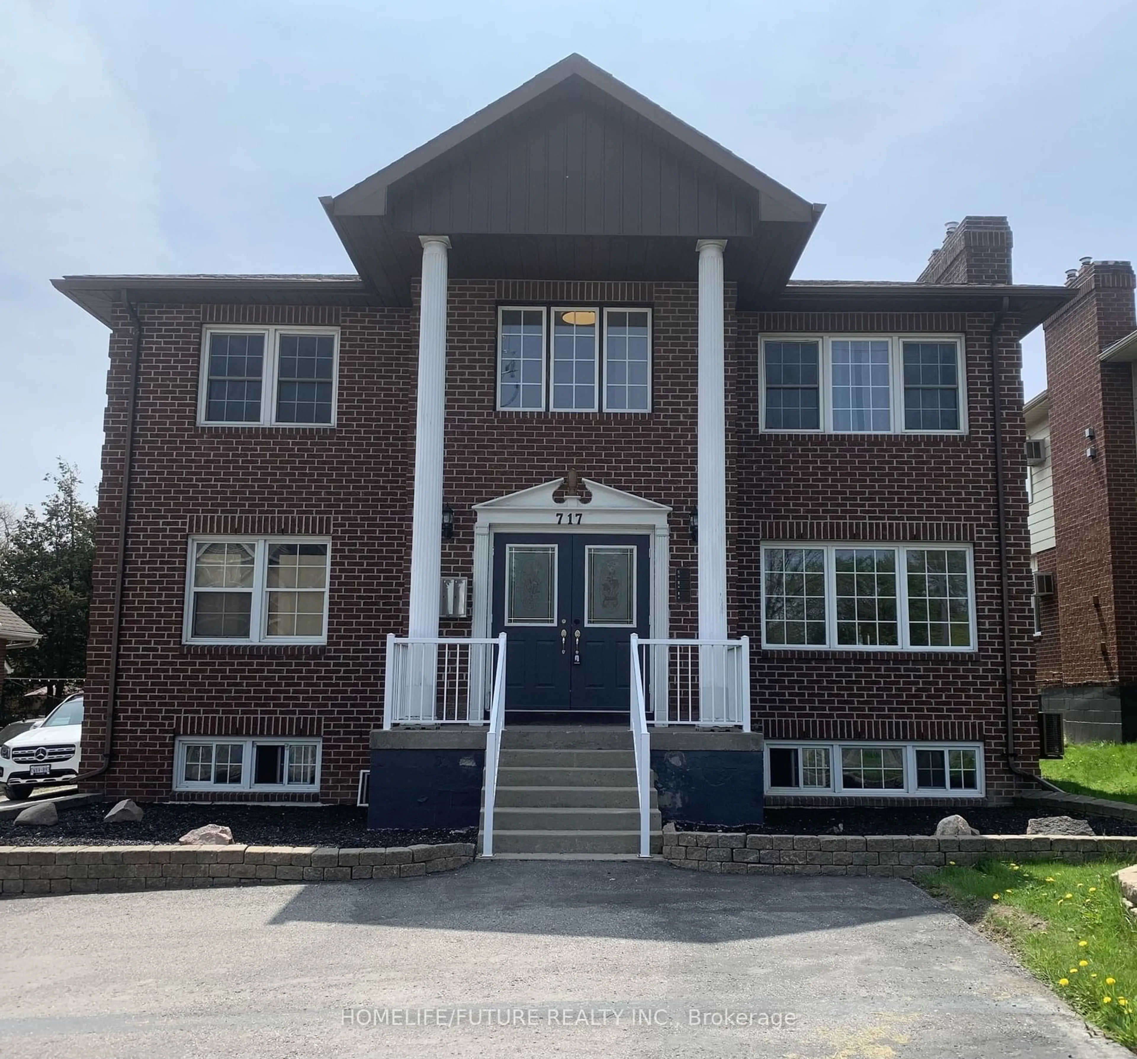 Home with brick exterior material for 717 King St, Oshawa Ontario L1J 2L2