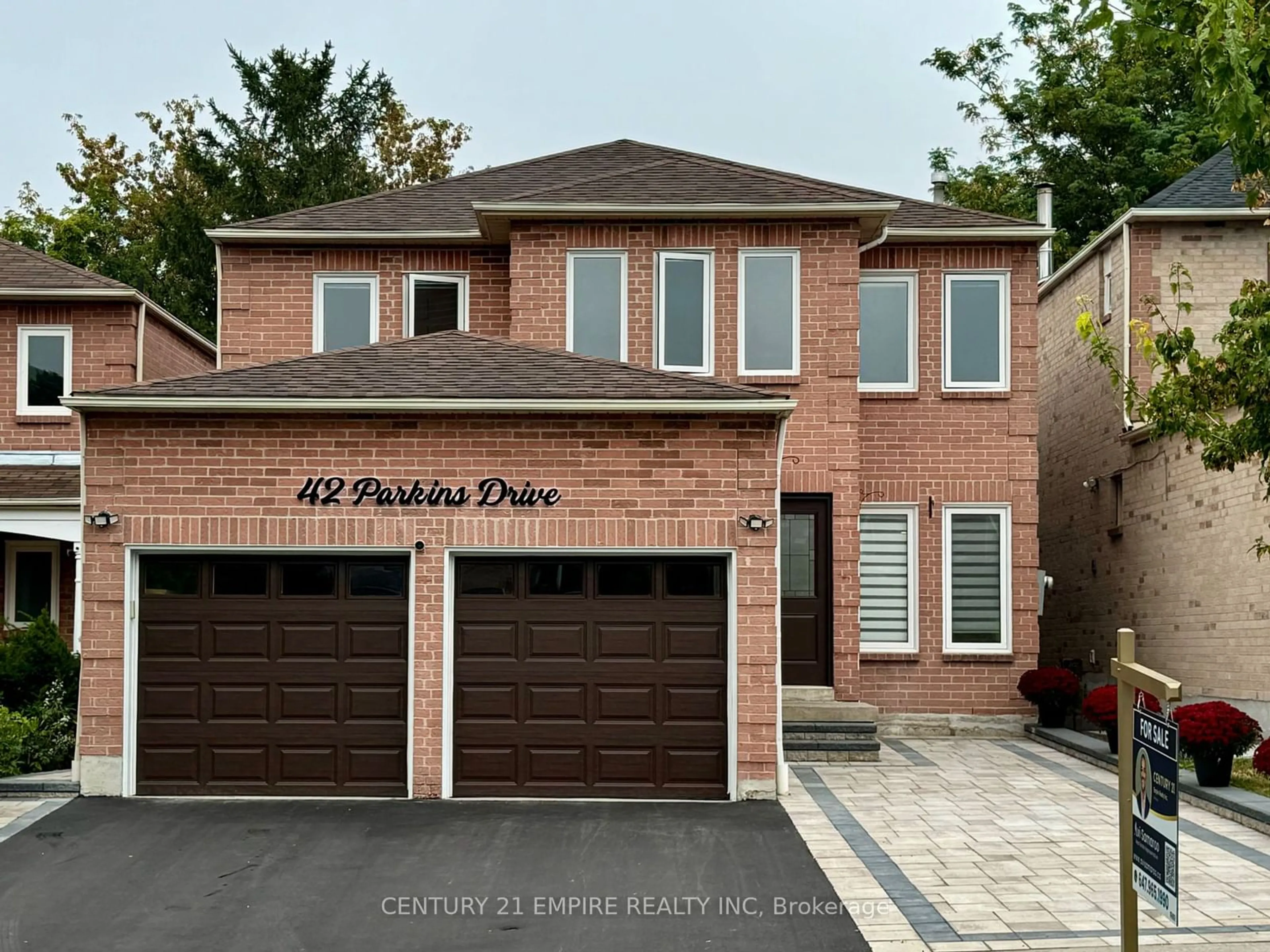 Home with brick exterior material for 42 Parkins Dr, Ajax Ontario L1T 3L2