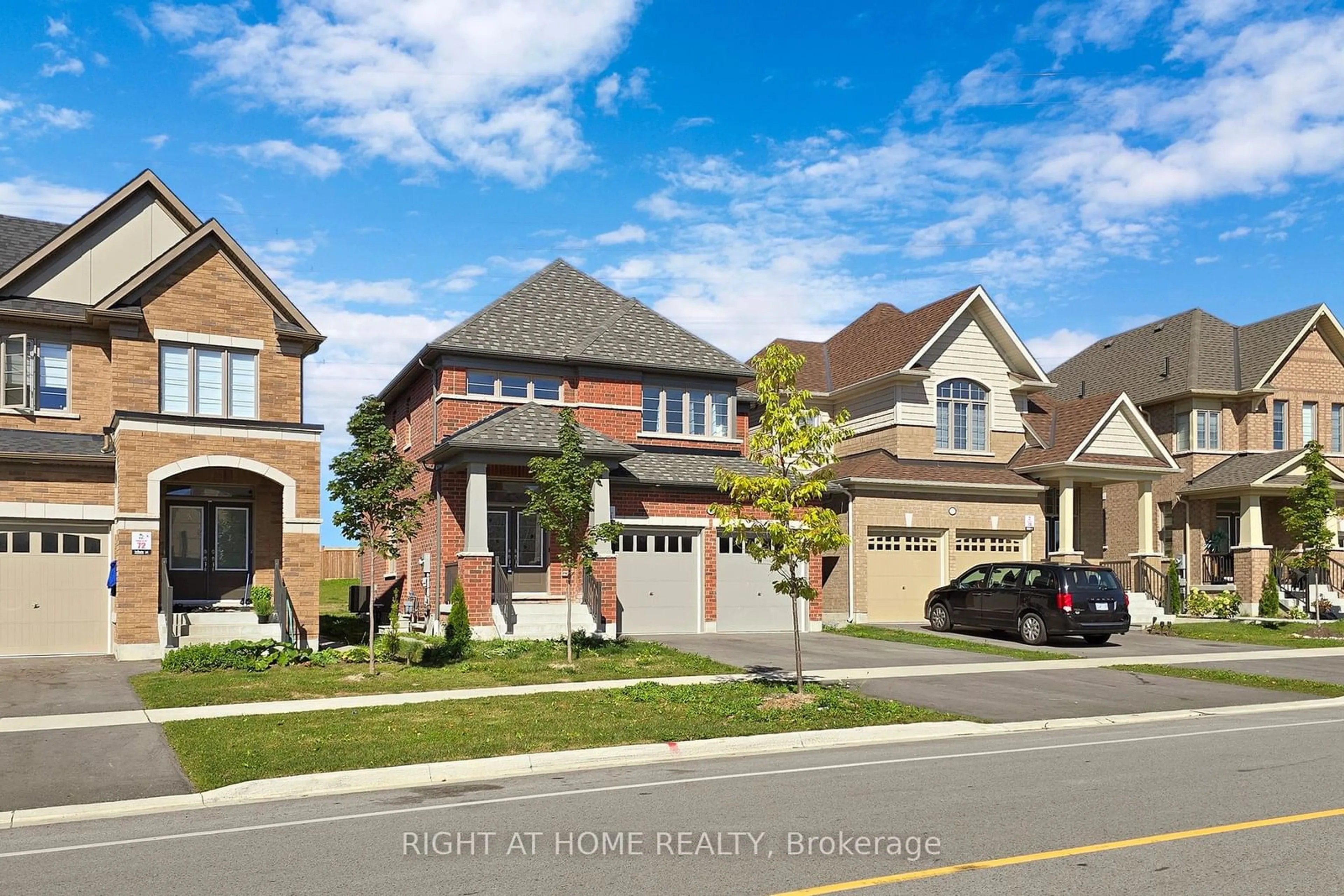 Frontside or backside of a home, the street view for 320 windfield farms Dr, Oshawa Ontario L1L 0M3