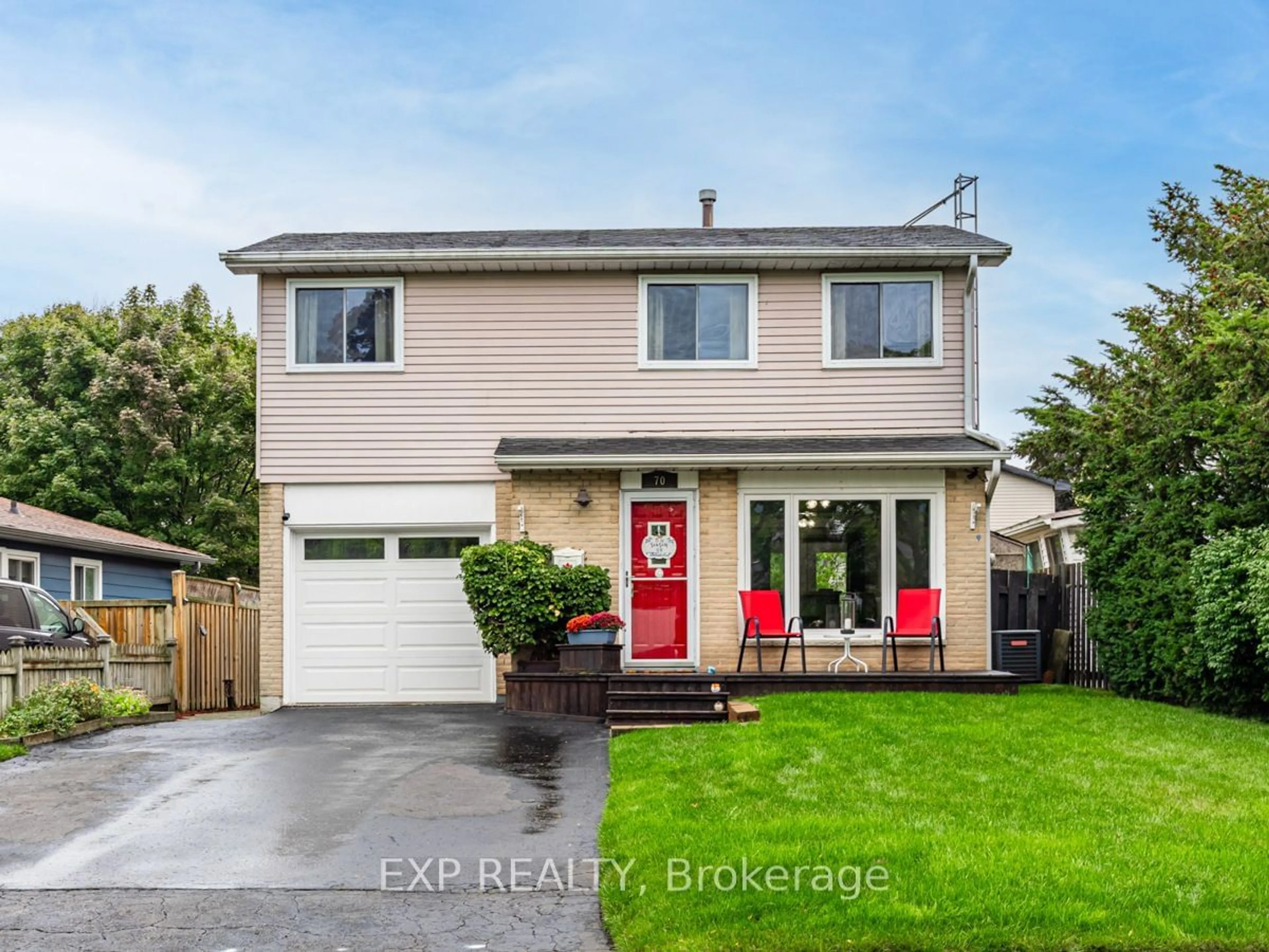 Frontside or backside of a home, the fenced backyard for 70 Slater Cres, Ajax Ontario L1S 3J4