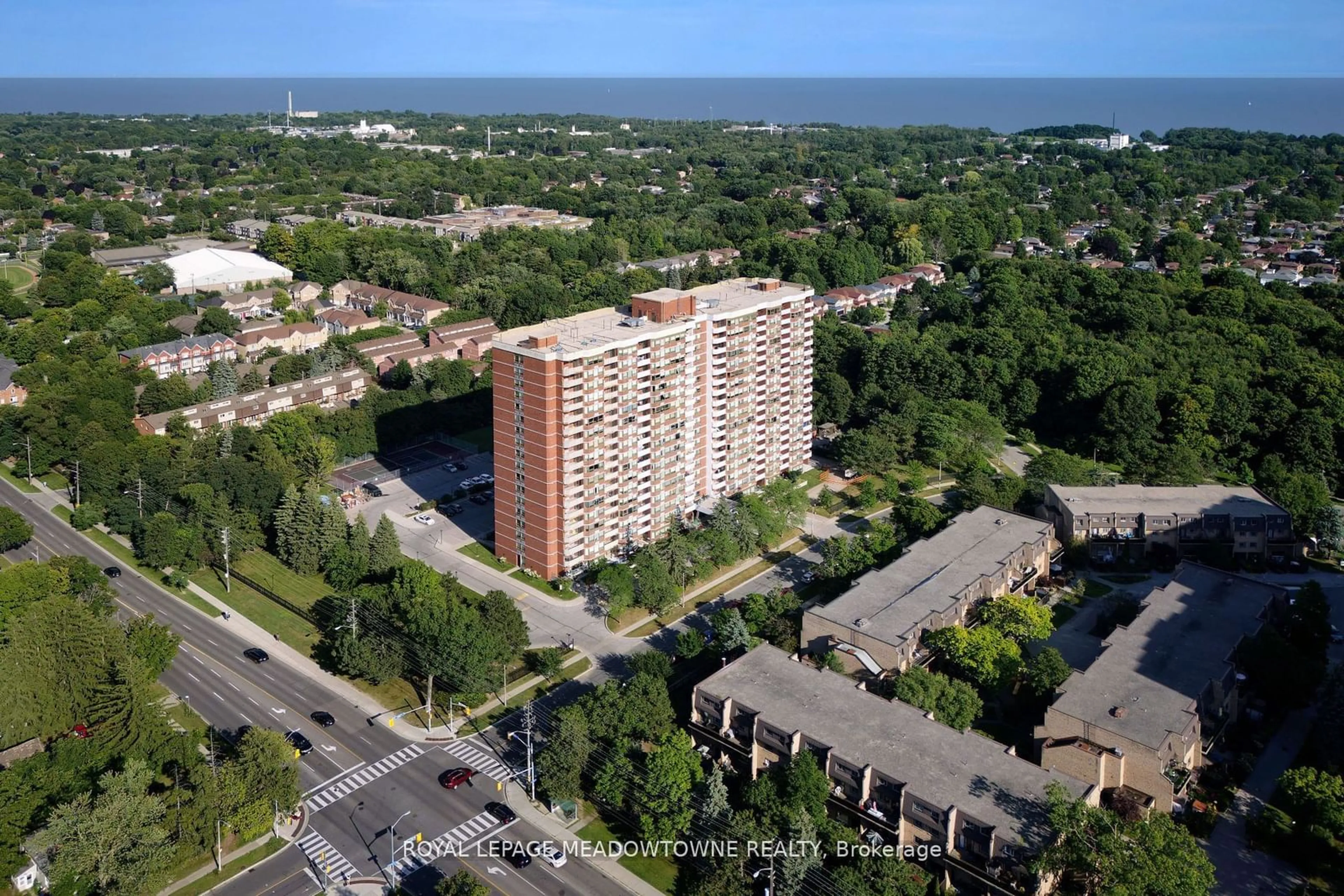 A pic from exterior of the house or condo, the street view for 121 Ling Rd #1212, Toronto Ontario M1E 4Y2