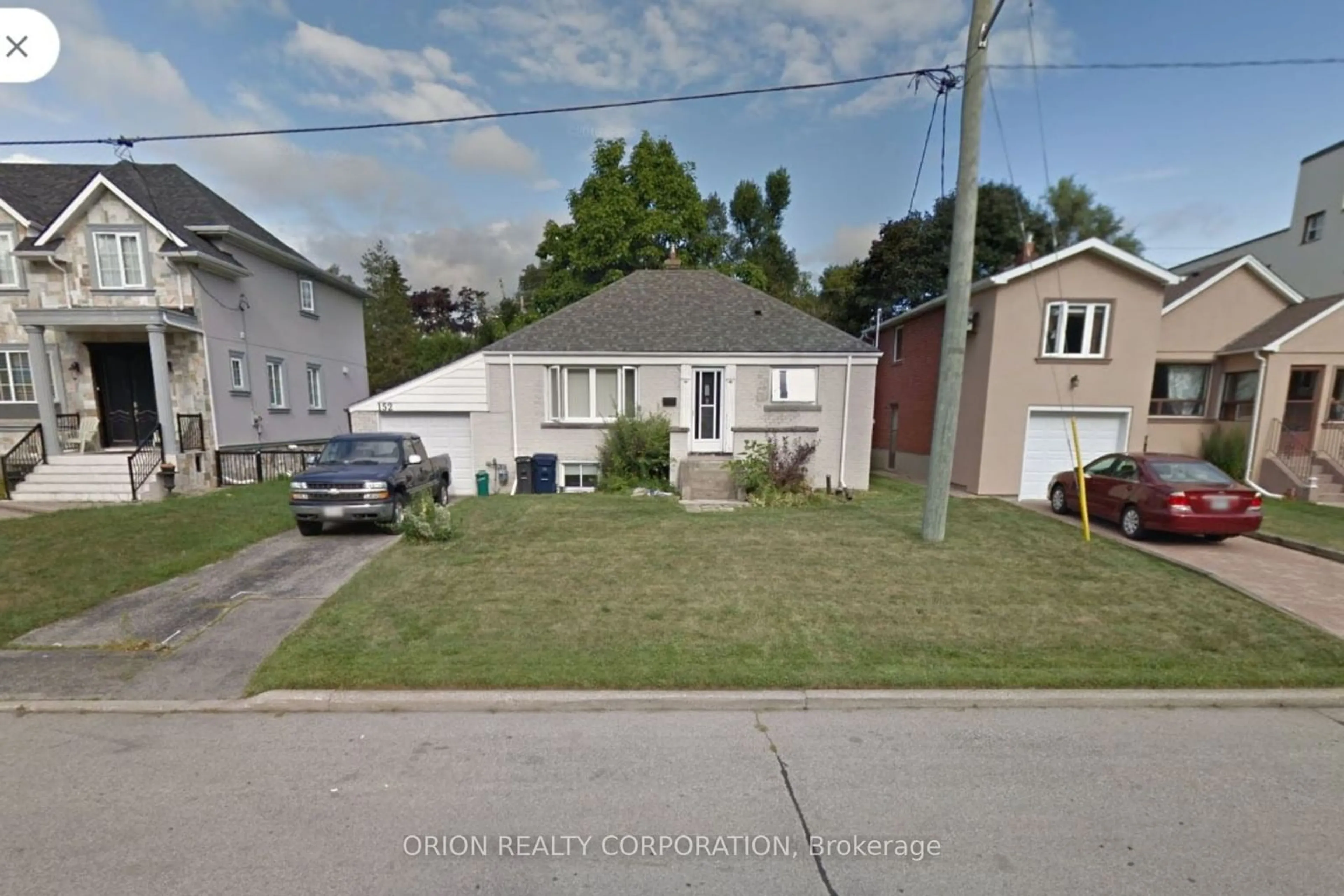 Frontside or backside of a home, the street view for 152 Pinegrove Ave, Toronto Ontario M1N 2G9