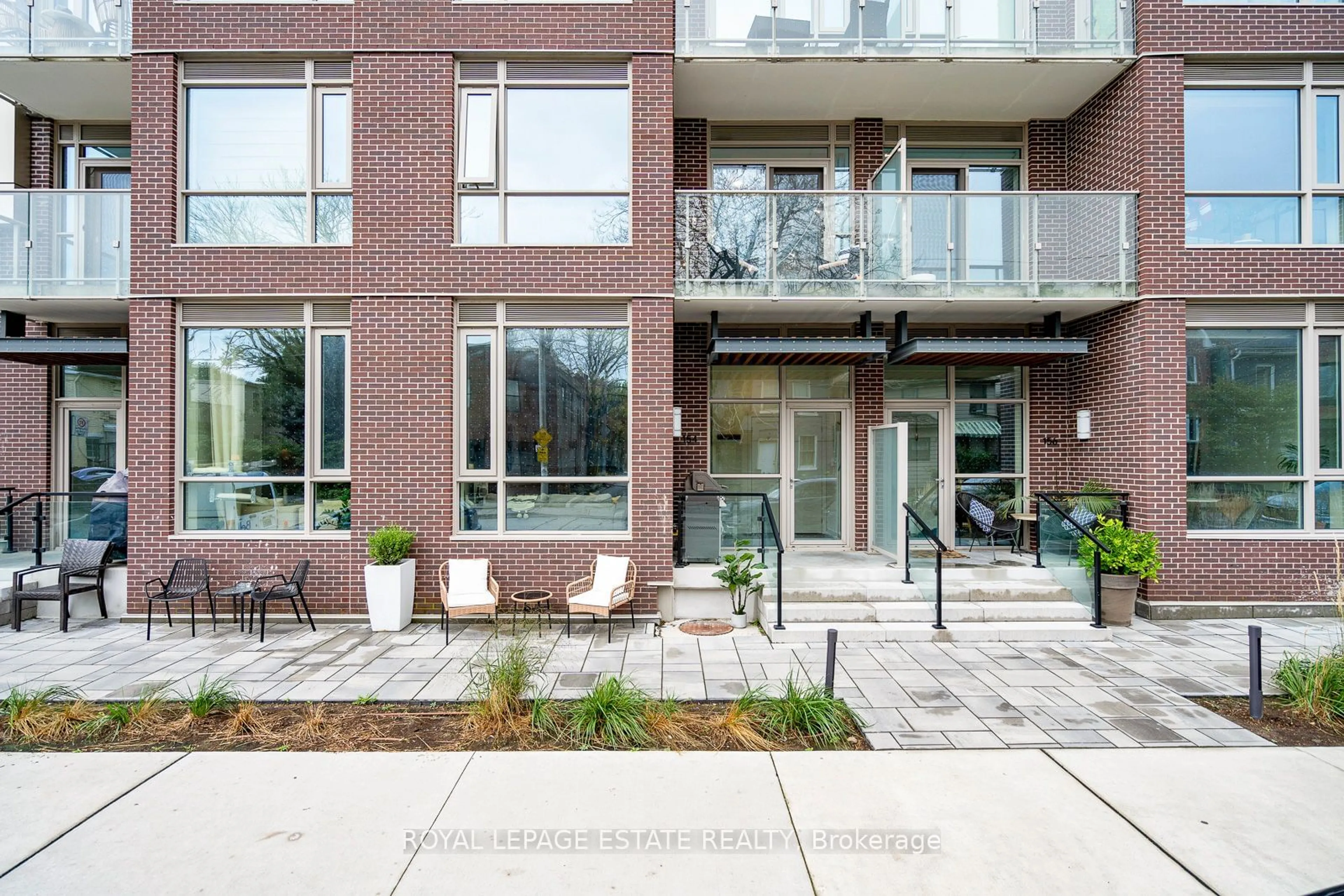 Home with brick exterior material for 154 Logan Ave, Toronto Ontario M4M 2N3