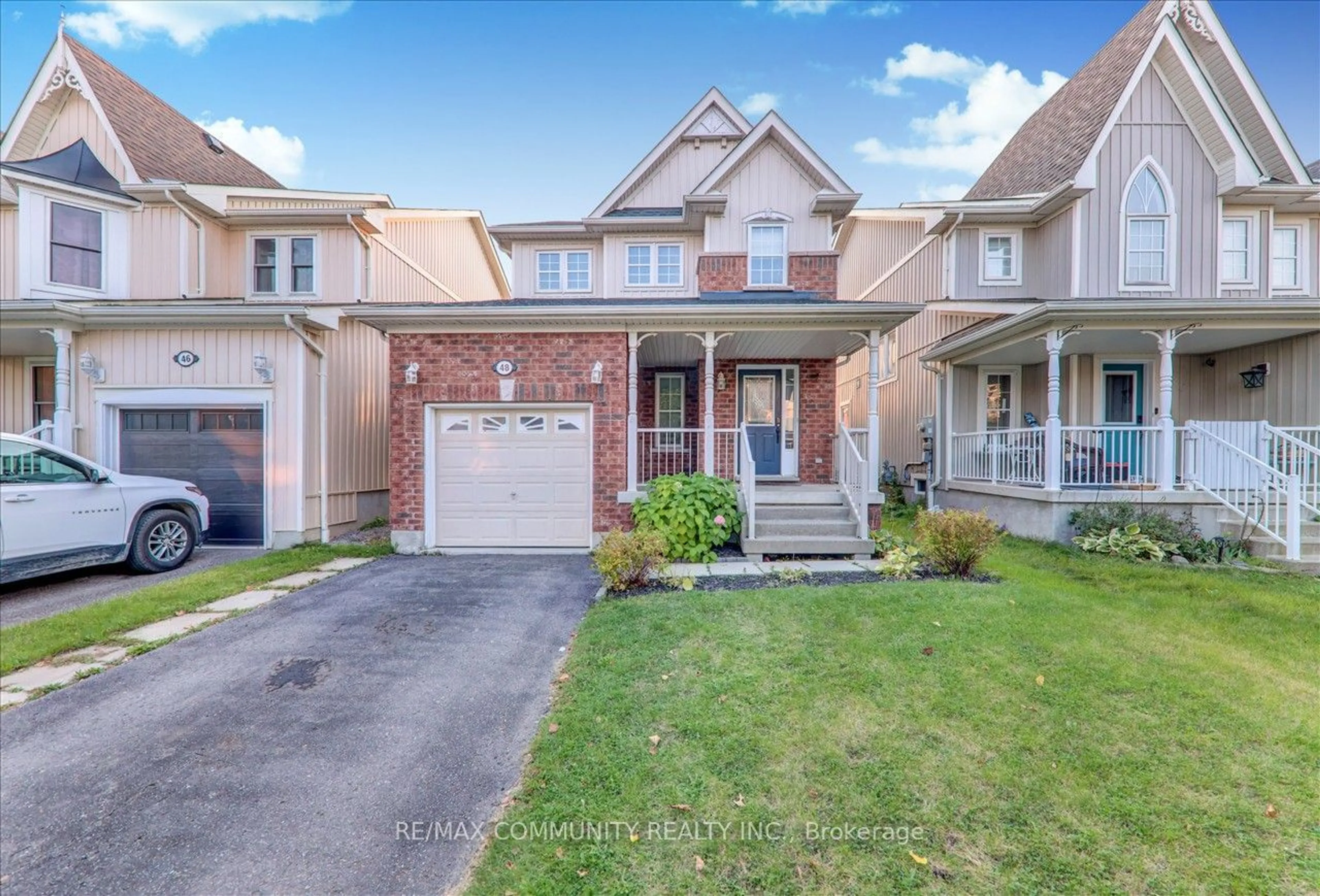 Frontside or backside of a home, the street view for 48 Cranborne Cres, Whitby Ontario L1M 2M1