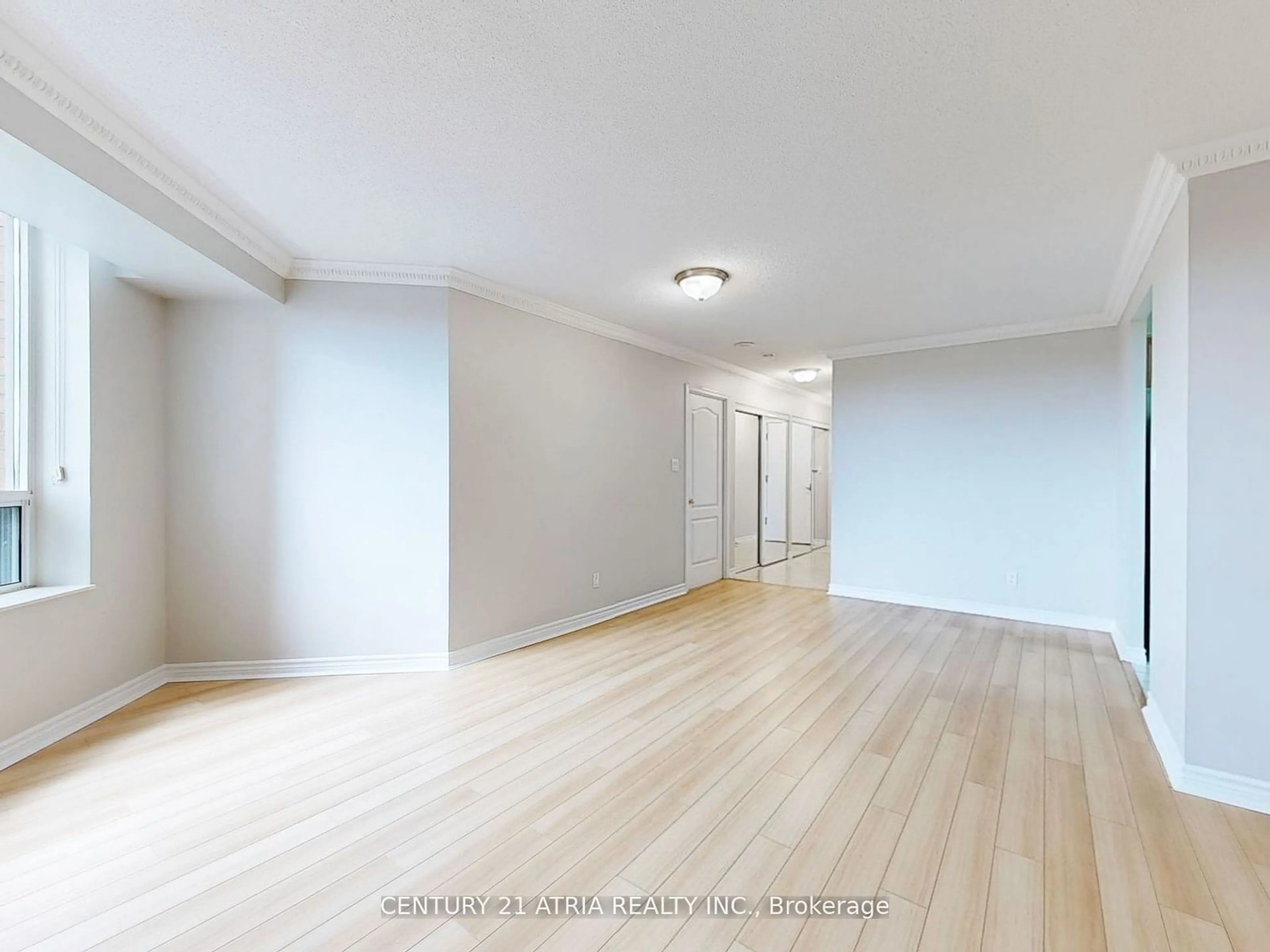 A pic of a room, wood floors for 1883 McNicoll Ave #601, Toronto Ontario M1V 5M3