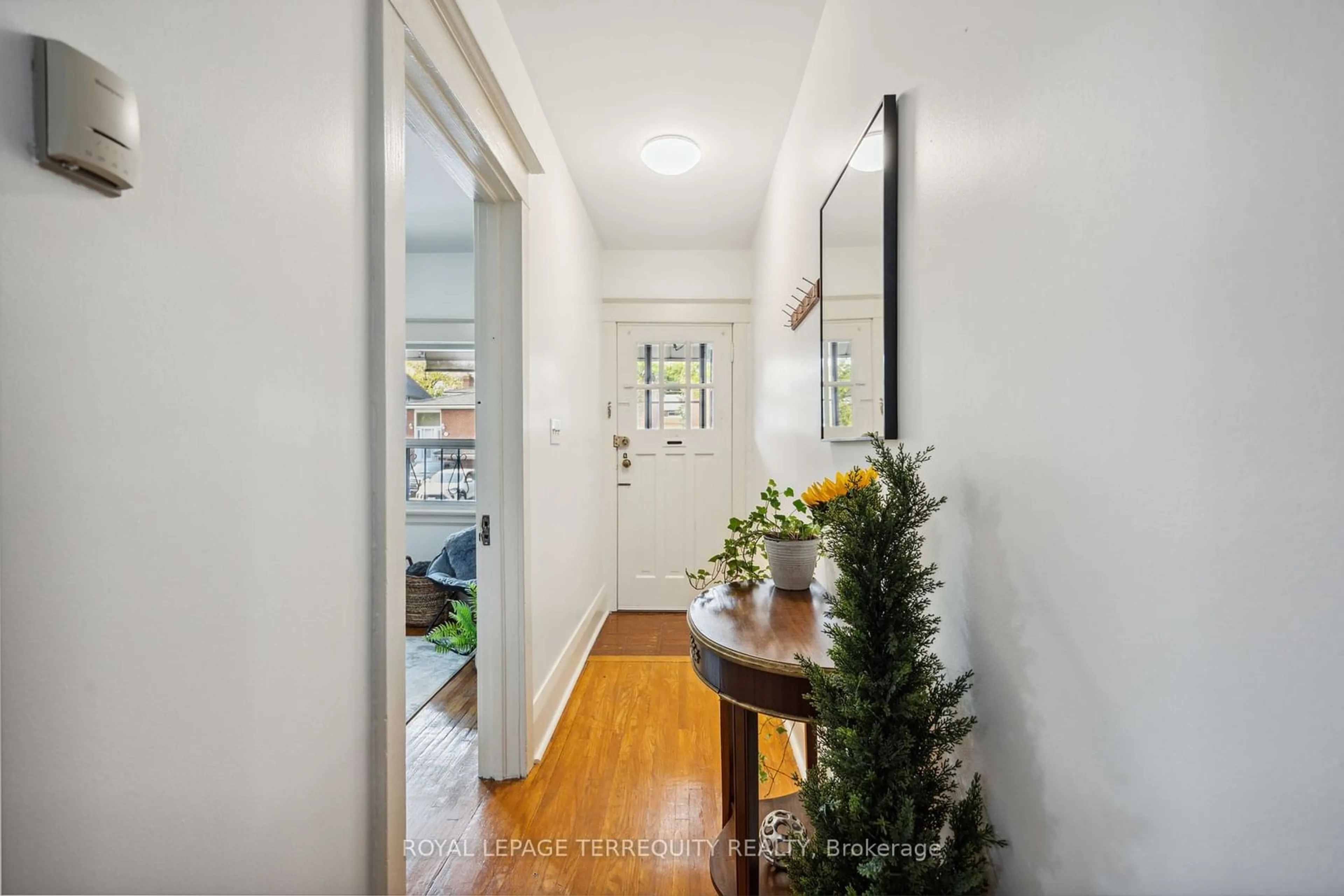 Indoor entryway, wood floors for 19 Curzon St, Toronto Ontario M4M 3B3