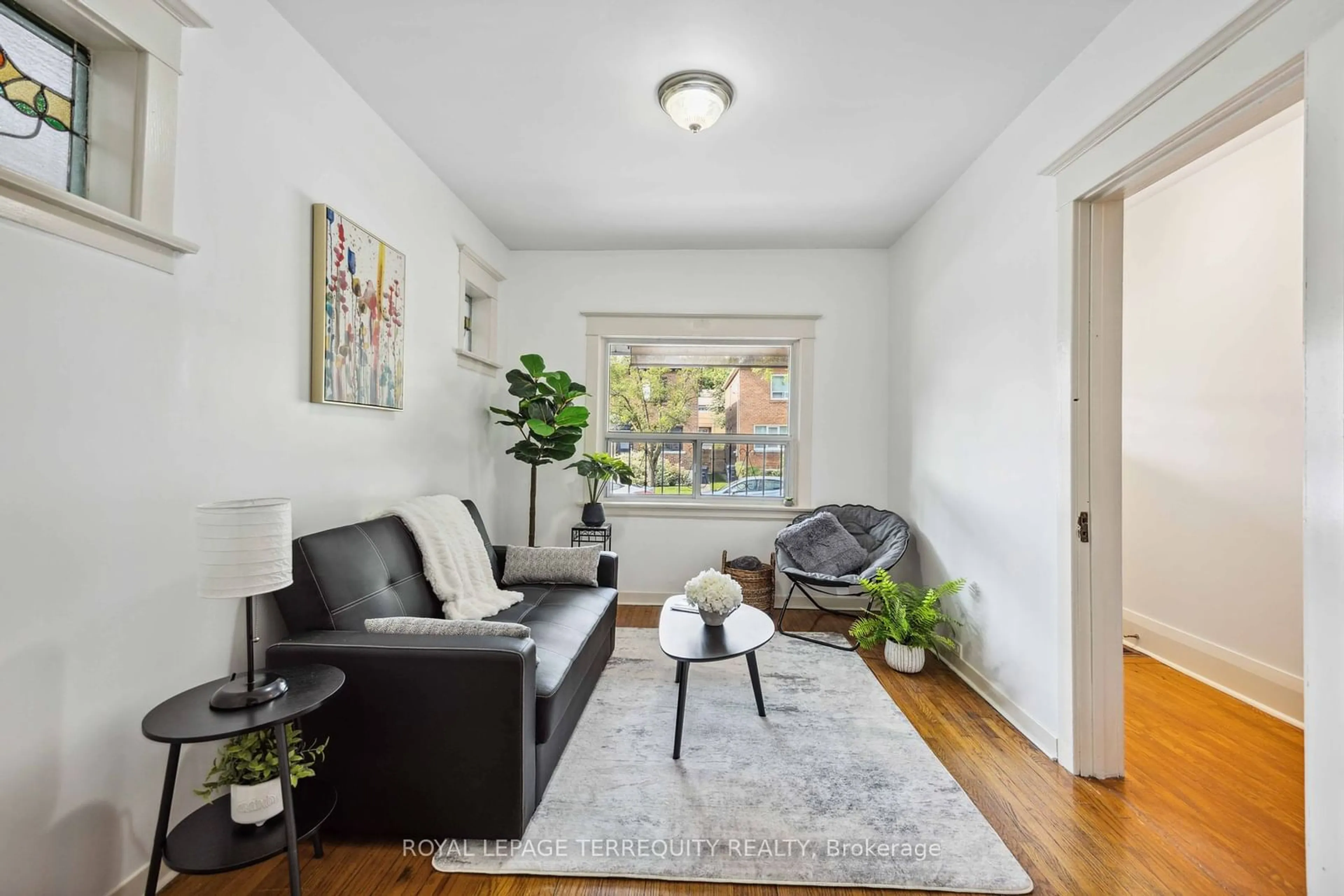 Living room, wood floors for 19 Curzon St, Toronto Ontario M4M 3B3