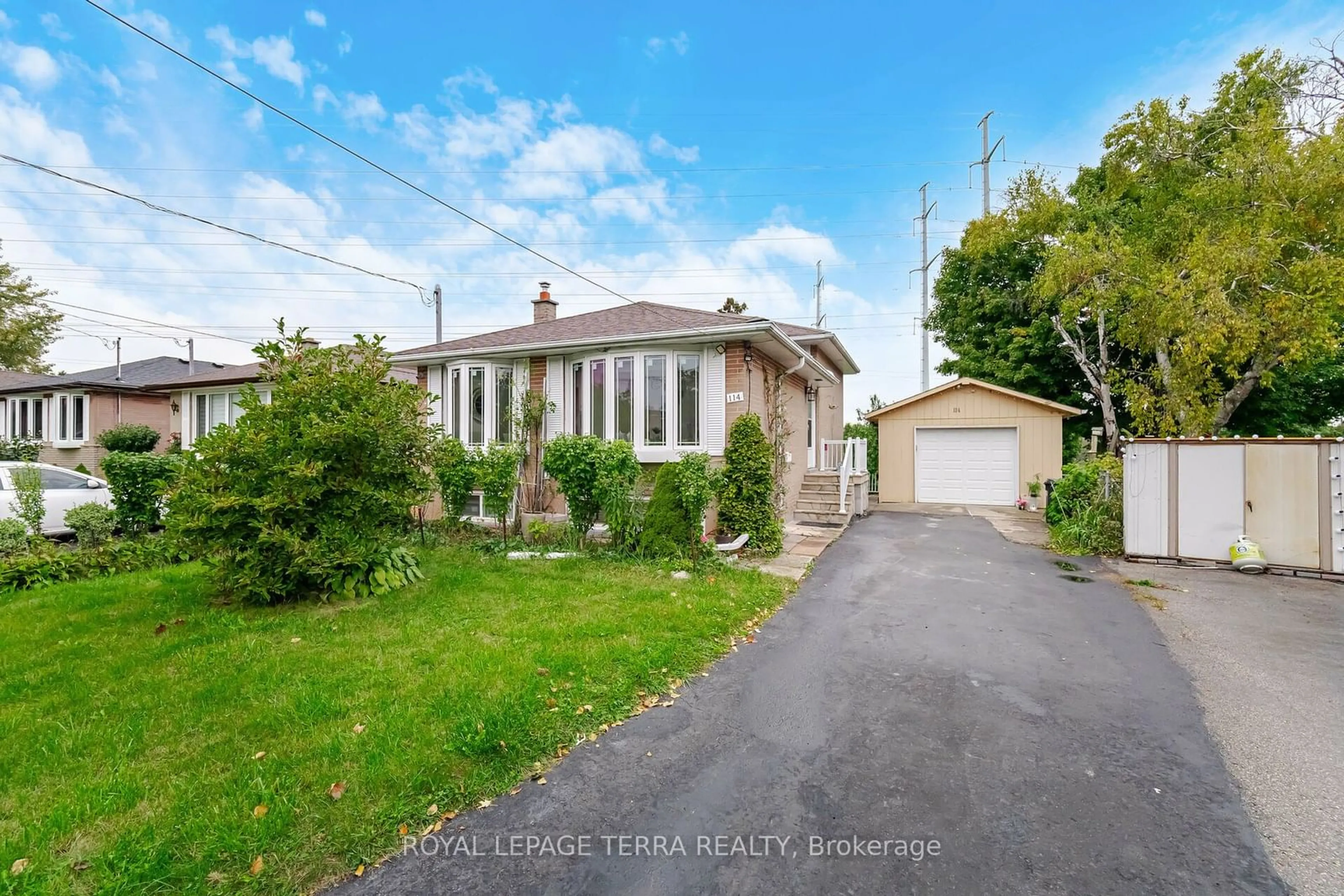 Frontside or backside of a home, the fenced backyard for 114 Milford Haven Dr, Toronto Ontario M1G 3E1