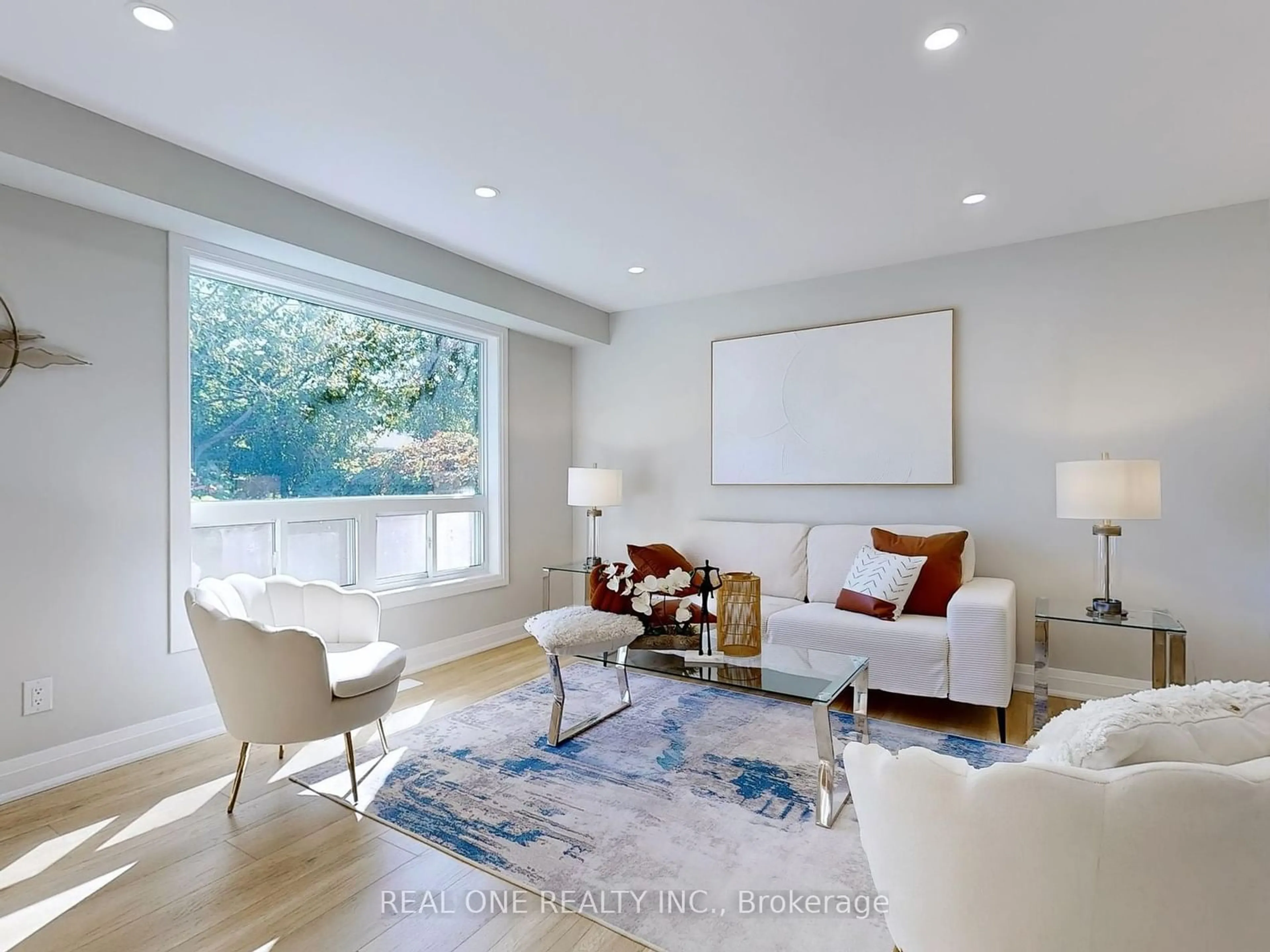 Living room, wood floors for 83 Glen Springs Dr, Toronto Ontario M1W 1X7