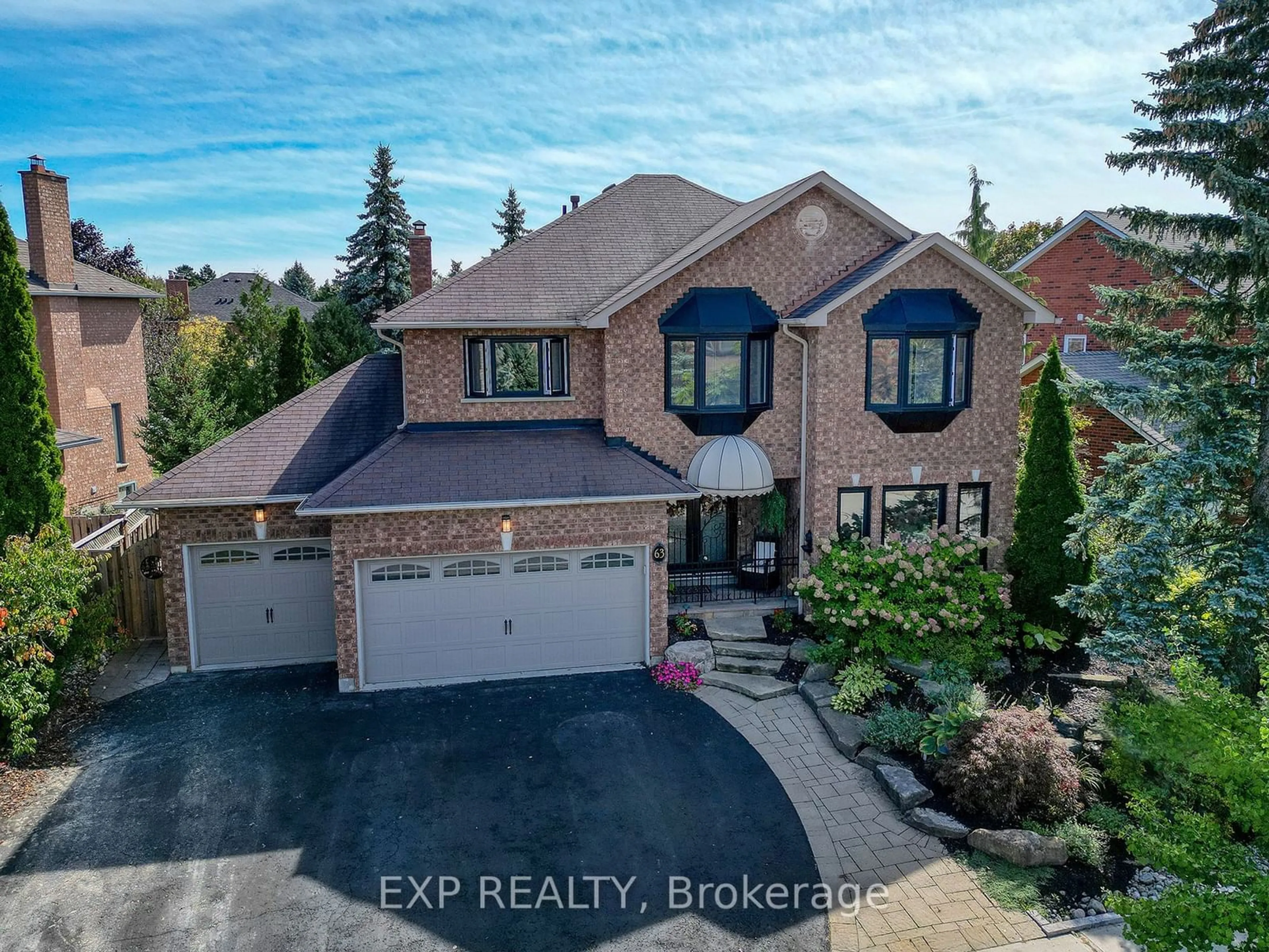 Frontside or backside of a home, the street view for 63 Kilbride Dr, Whitby Ontario L1R 2B5