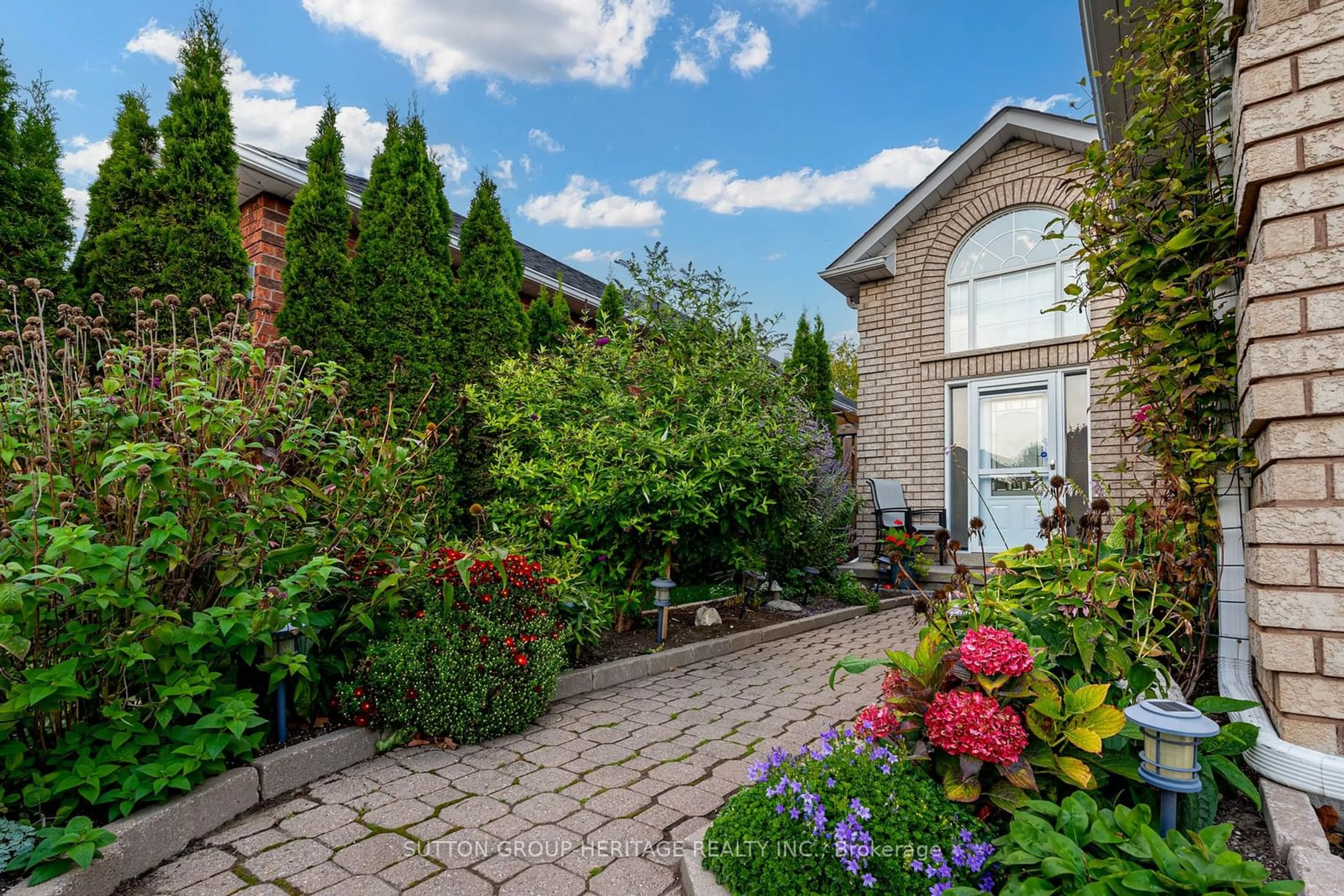 Patio, the fenced backyard for 65 West Side Dr, Clarington Ontario L1C 4Y8