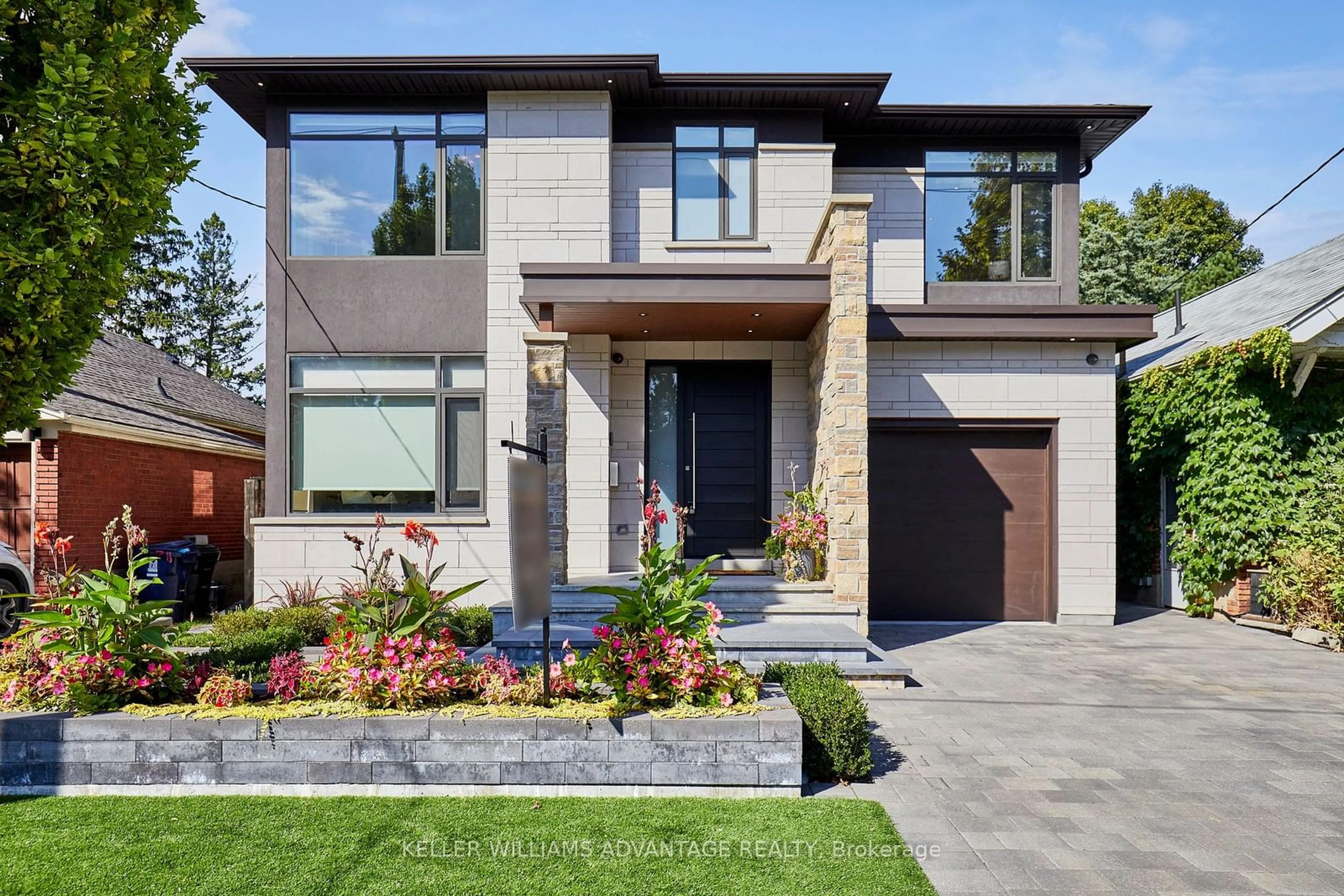 Home with brick exterior material for 18 Coxwell Blvd, Toronto Ontario M4C 3G7