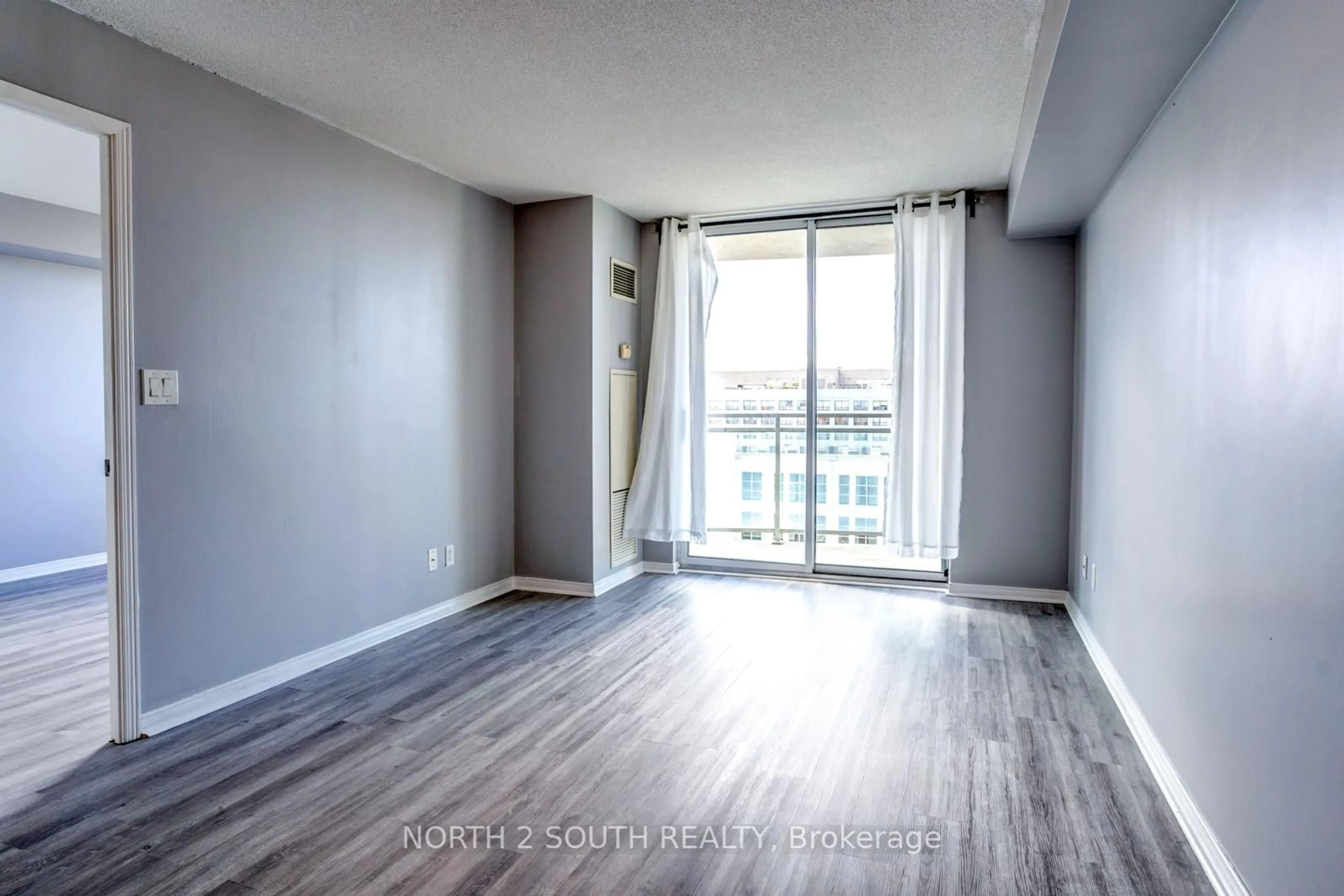 A pic of a room, wood floors for 8 Rosebank Dr #9G, Toronto Ontario M1B 5Z3