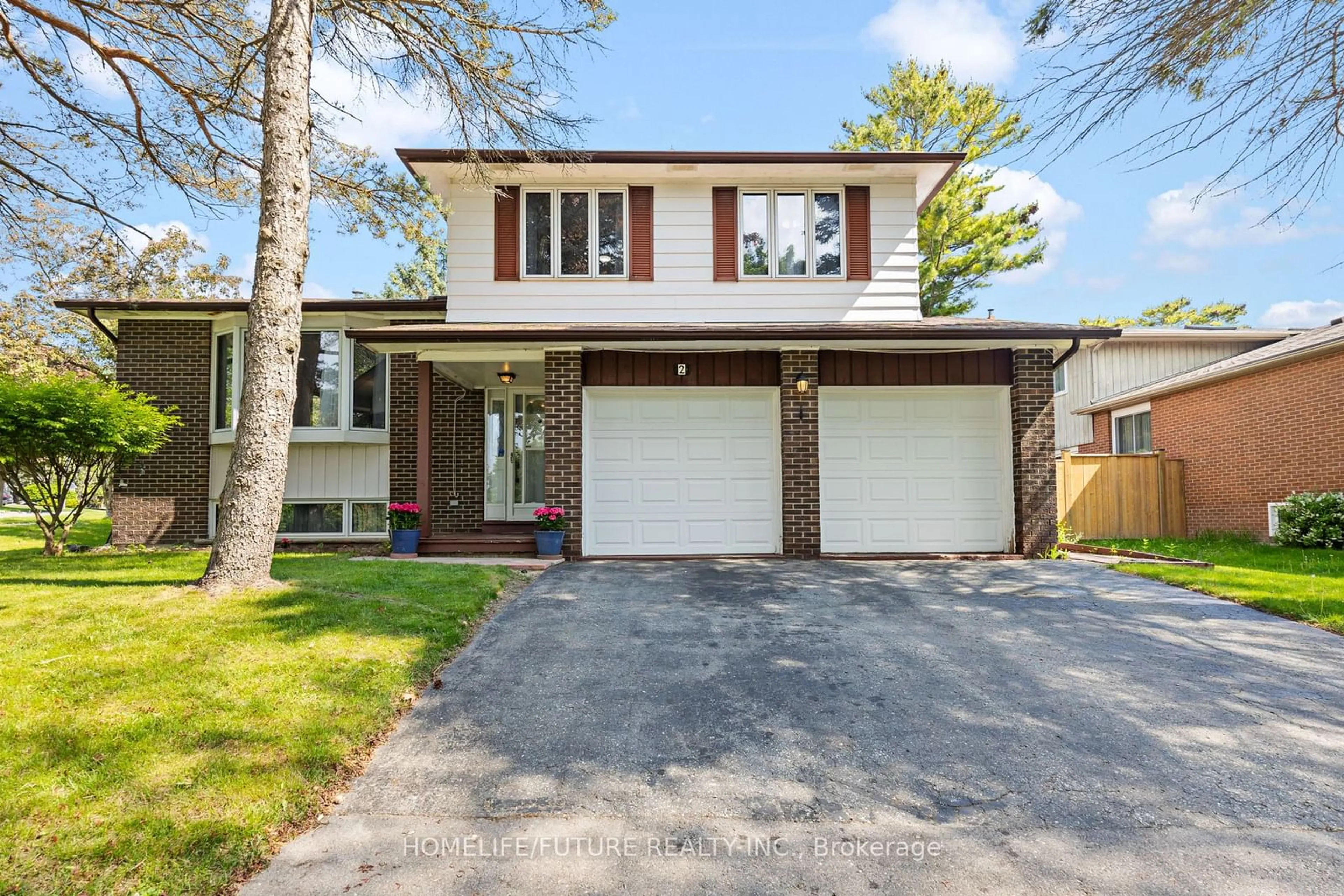 Home with brick exterior material for 2 Feagan Dr, Toronto Ontario M1C 3B7