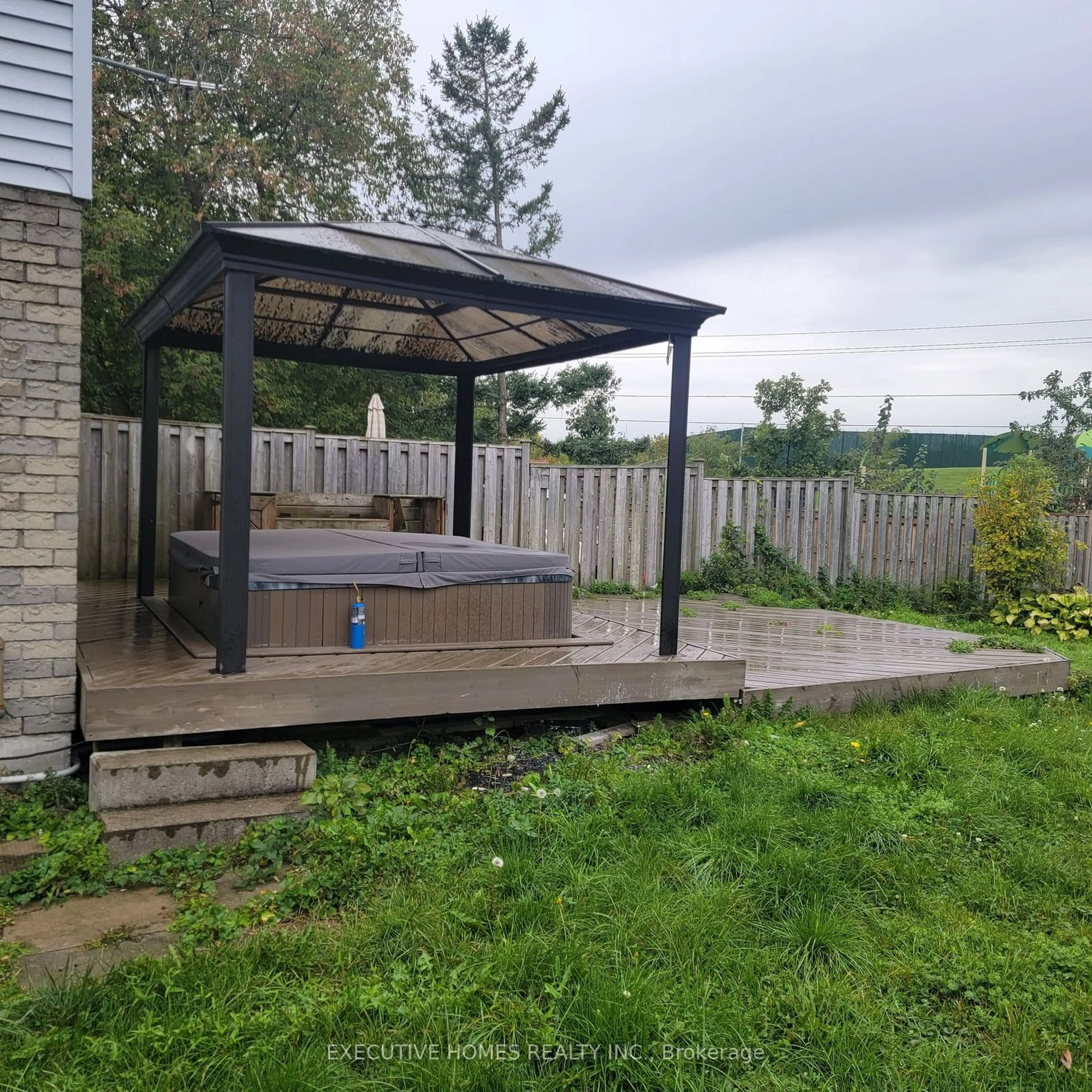 Patio, the fenced backyard for 1411 Beaverbrook Crt, Oshawa Ontario L1J 8L1