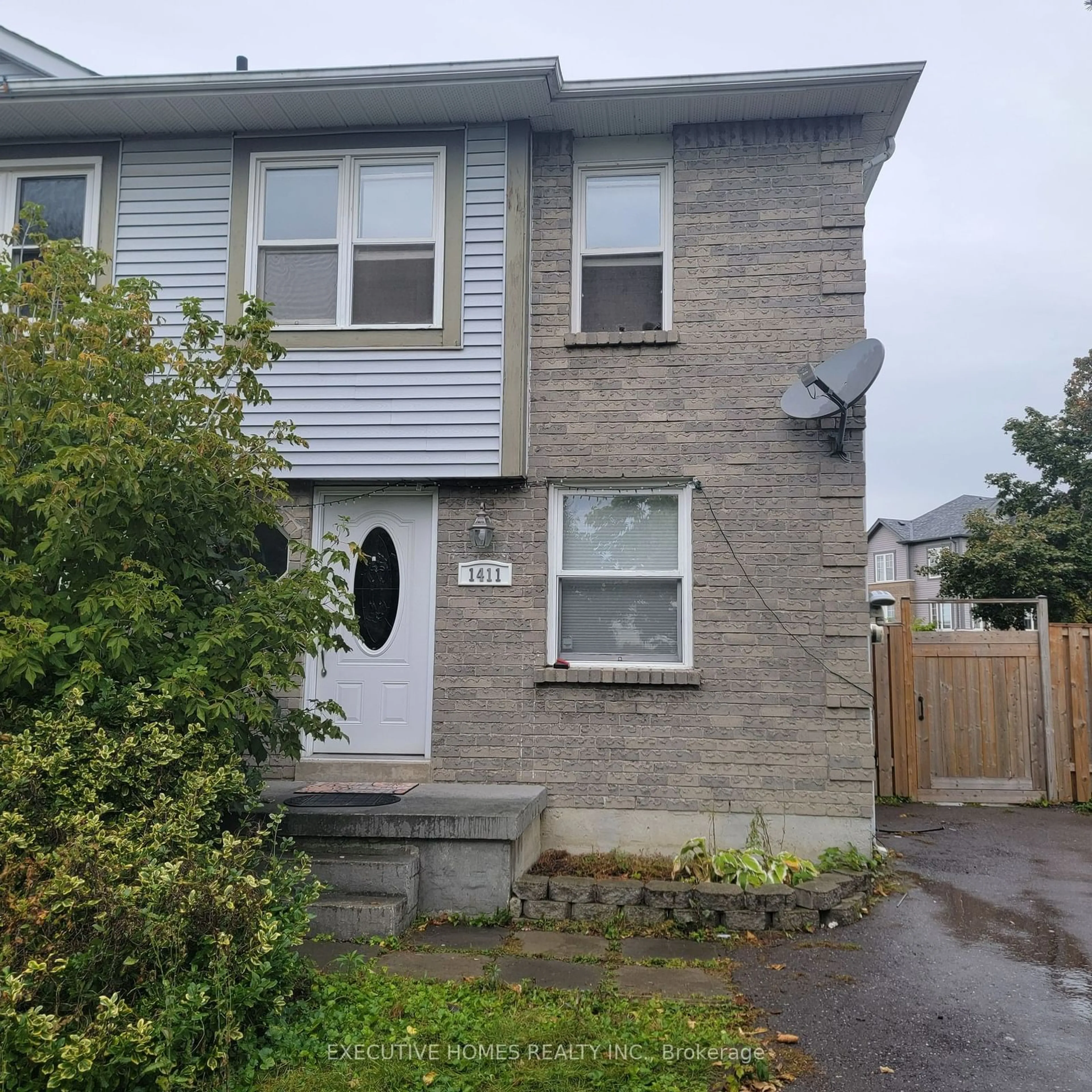 A pic from exterior of the house or condo, the front or back of building for 1411 Beaverbrook Crt, Oshawa Ontario L1J 8L1