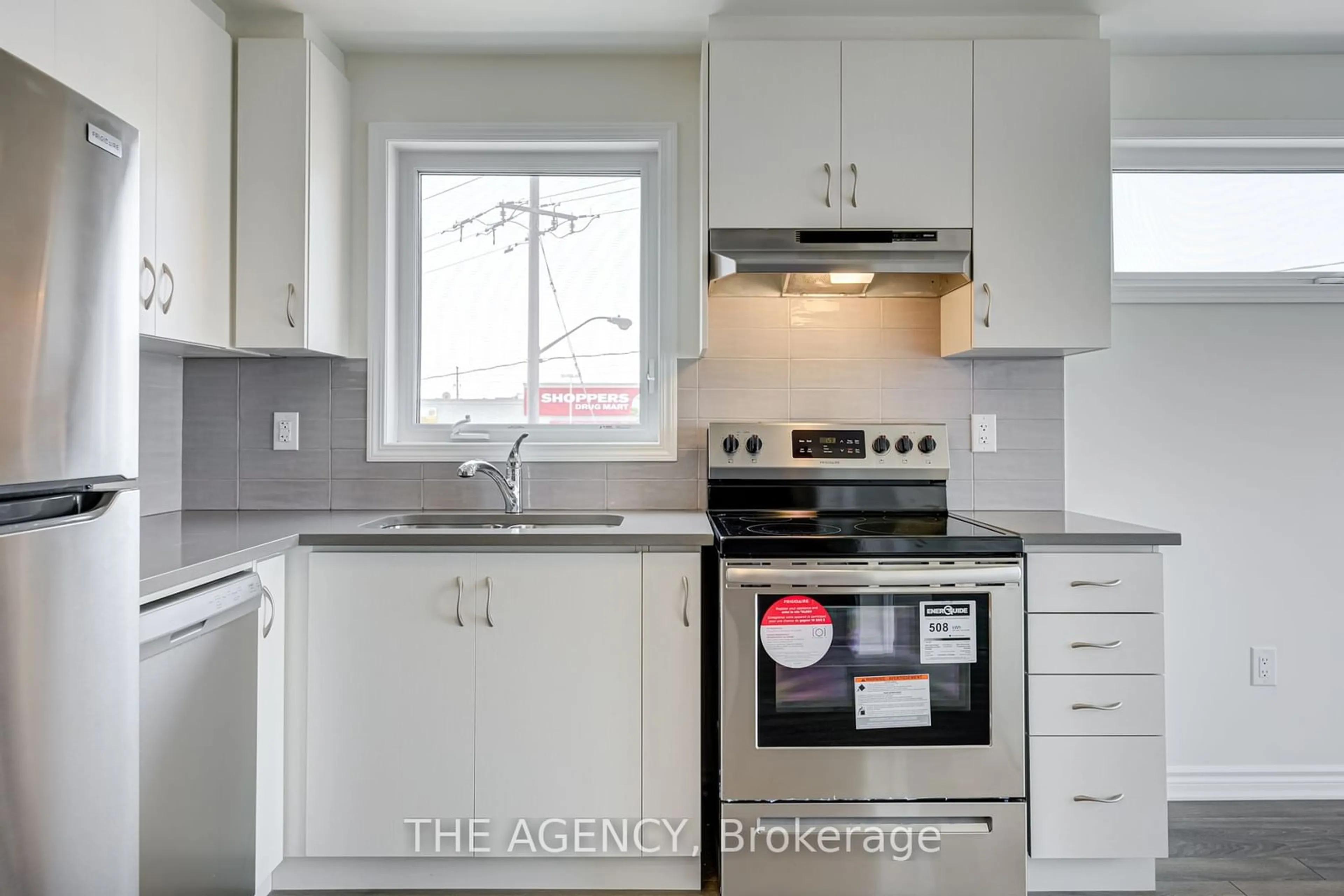 Standard kitchen, wood floors, cottage for 2787 Eglinton Ave #329, Toronto Ontario M1J 2E1